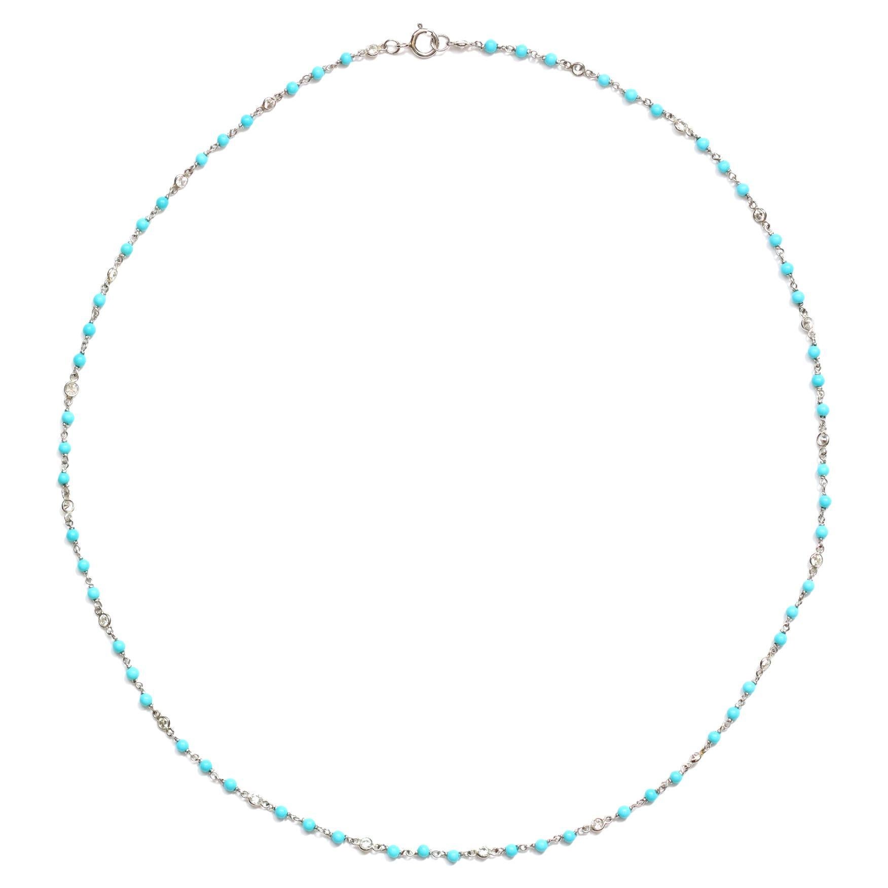 A dainty handmade Platinum necklace signed by Rosaria Varra featuring alternating round turquoise beads and bezel-set round diamonds. The natural untreated turquoise beads are 2 millimeter in diameter and very well matched in color. The estimated