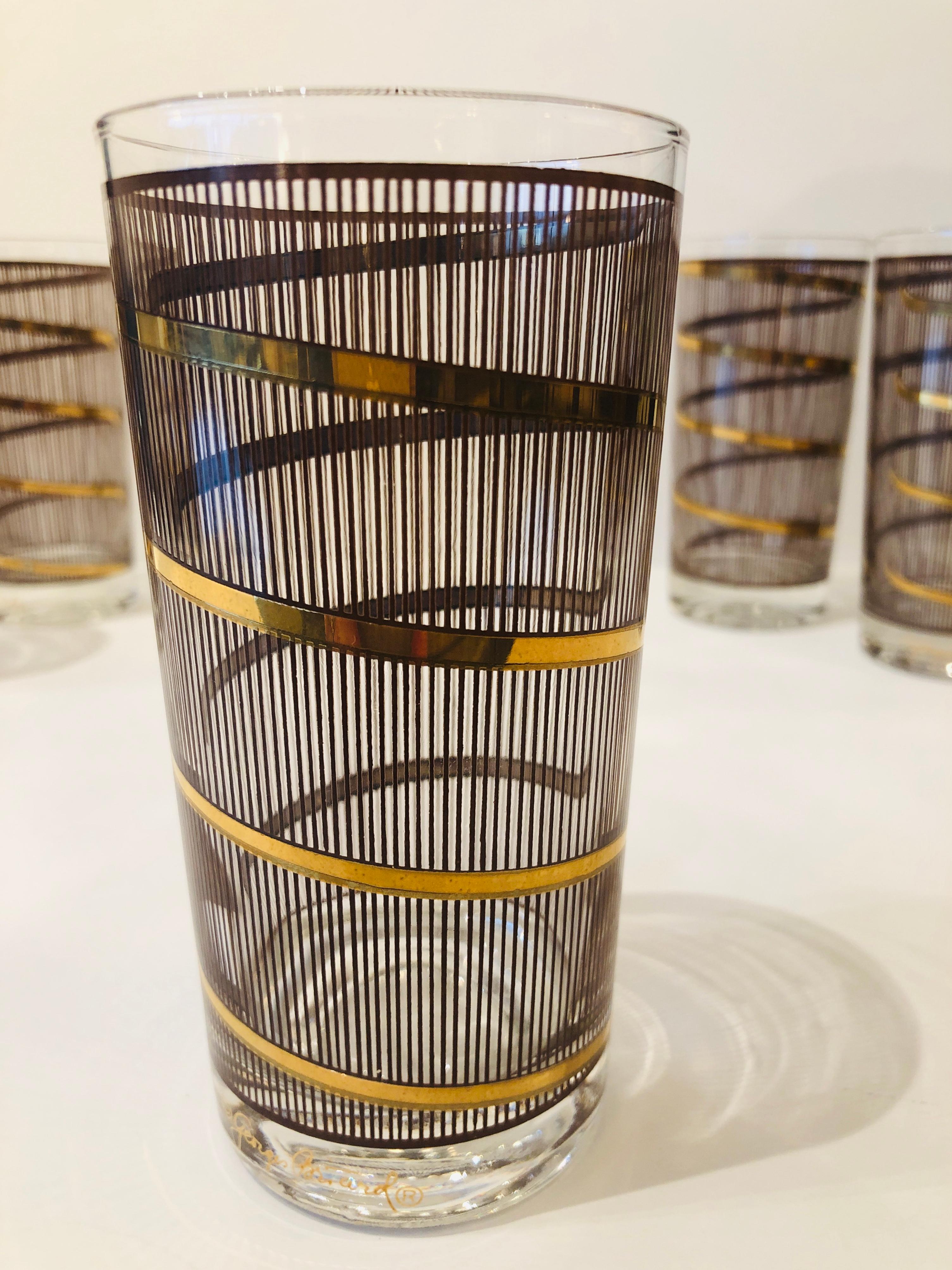 Offered is a set of six Mid-Century Modern signed Georges Briard pressed smoked and gold gilt glass cocktail glasses / barware with a modern circular gold gilt design over a chocolate brown vertical line. Truly groovy barware. Would look fabulous on