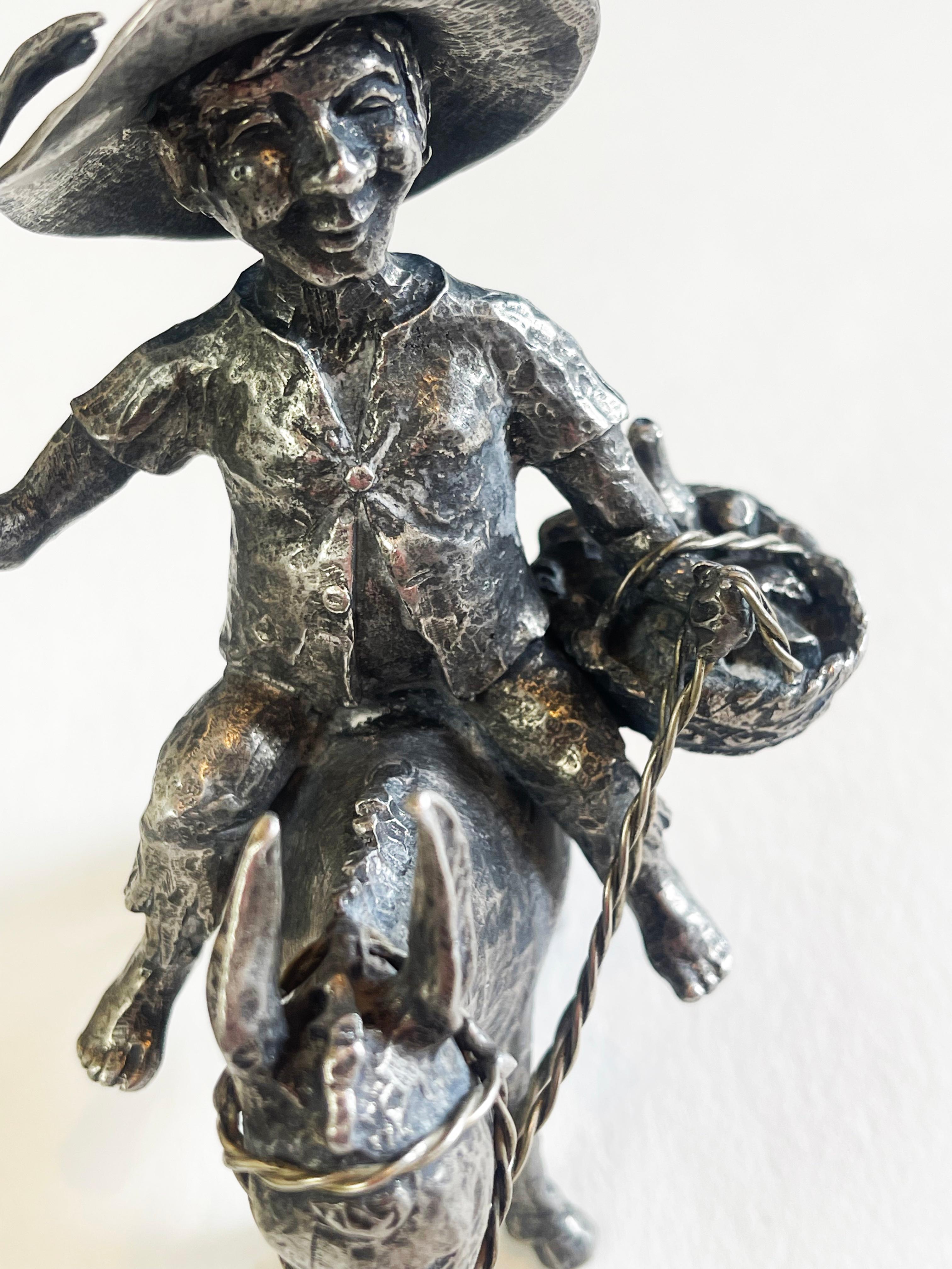 Sancho Panza montado en su burro, estatuilla de estaño esculpida por Michel Laude, Francia 1
