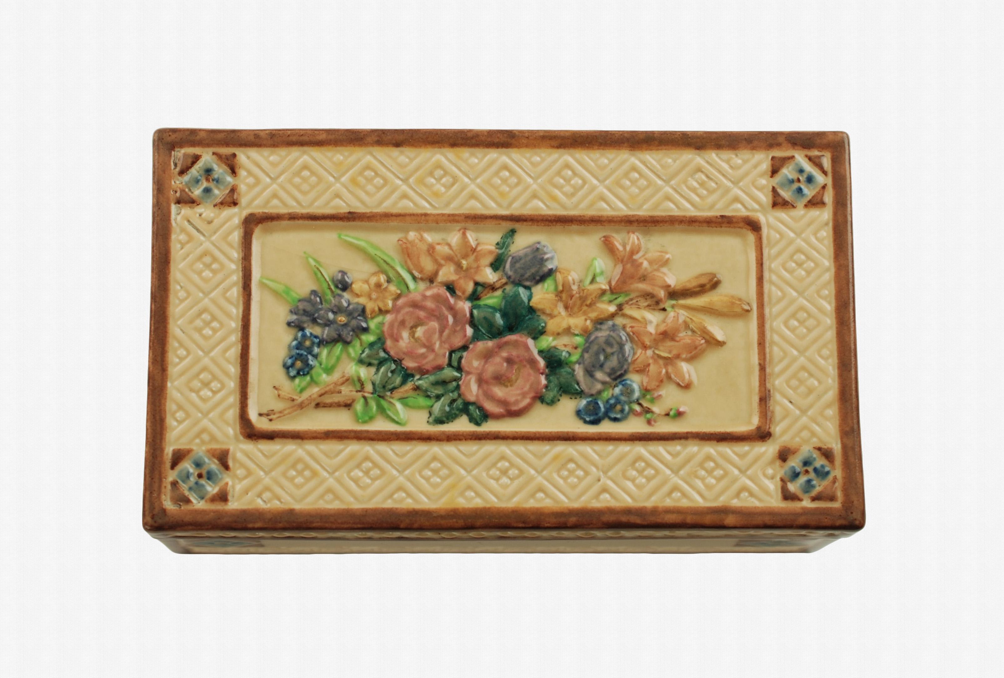 Signed Rookwood Pottery box by Sara Sax. This gorgeous ceramic lidded rectangular box was made by Rookwood Pottery of Cincinnati, Ohio, and decorated by renowned artist, Sara Sax. Rookwood has long been recognized as one of the premier producers of