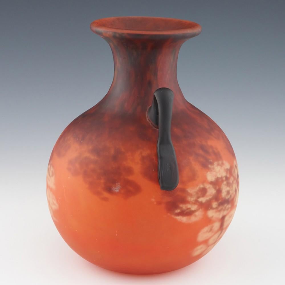 Heading : Signed Schneider amphora vase
Date : c1928
Origin : Epinay-sur-Seine
Bowl Features : Amphora shaped with mottled plum, blood orange, and citrus yellow glass. The pale yellow is formed into honeycombs. Two appplied glass handles.
Marks :