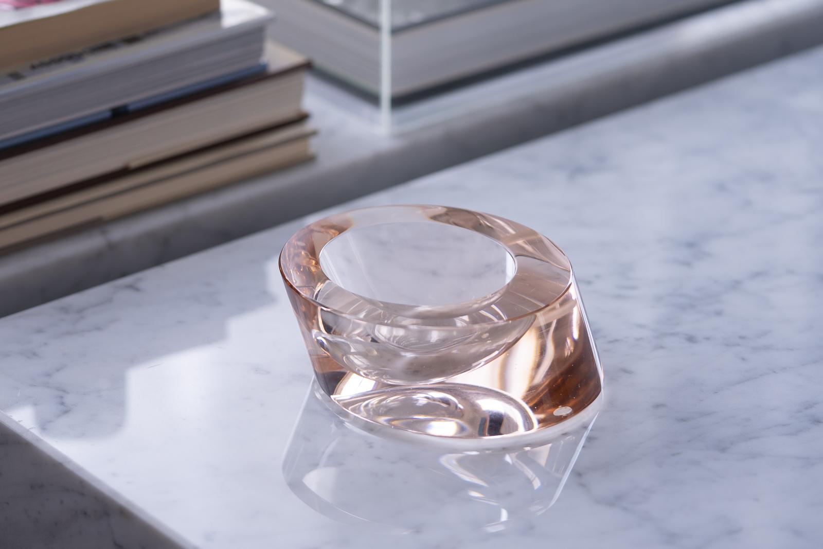 A stunning blush-colored angled blown glass dish dating from the early 1970s by Murano workshop Seguso Vetri d'Arte. The beautiful pale rose- or pink-colored dish seems to glow from within when hit by light. The graceful combination of curves and