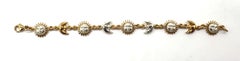Bracciale a maglie con sole e luna in argento e vermeil firmato Sergio Bustamante, anni '90