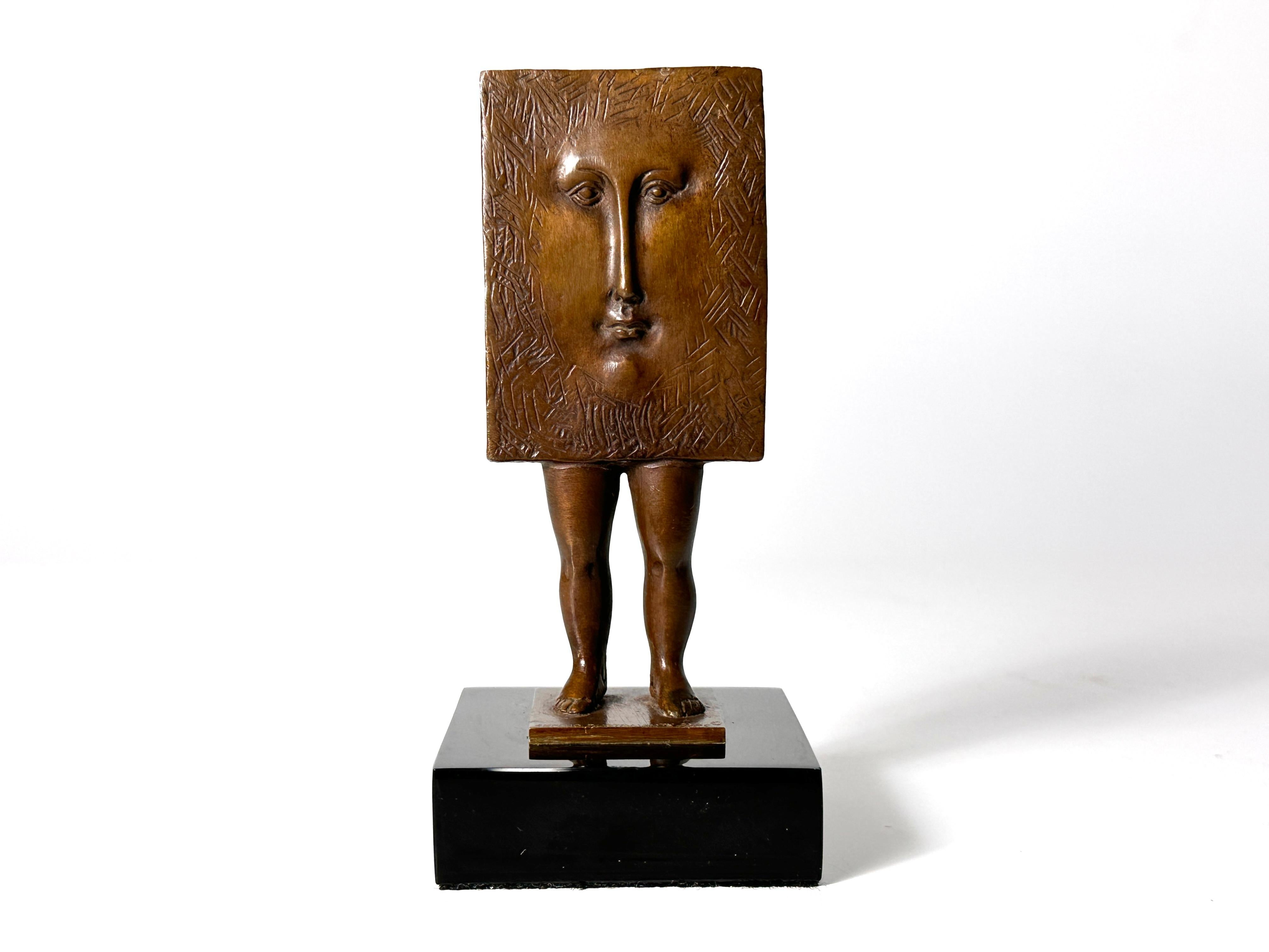 Surrealist bronze sculpture by Sergio Bustamante circa 1990s
Abstract square face with legs on a black marble base 
Signed and numbered