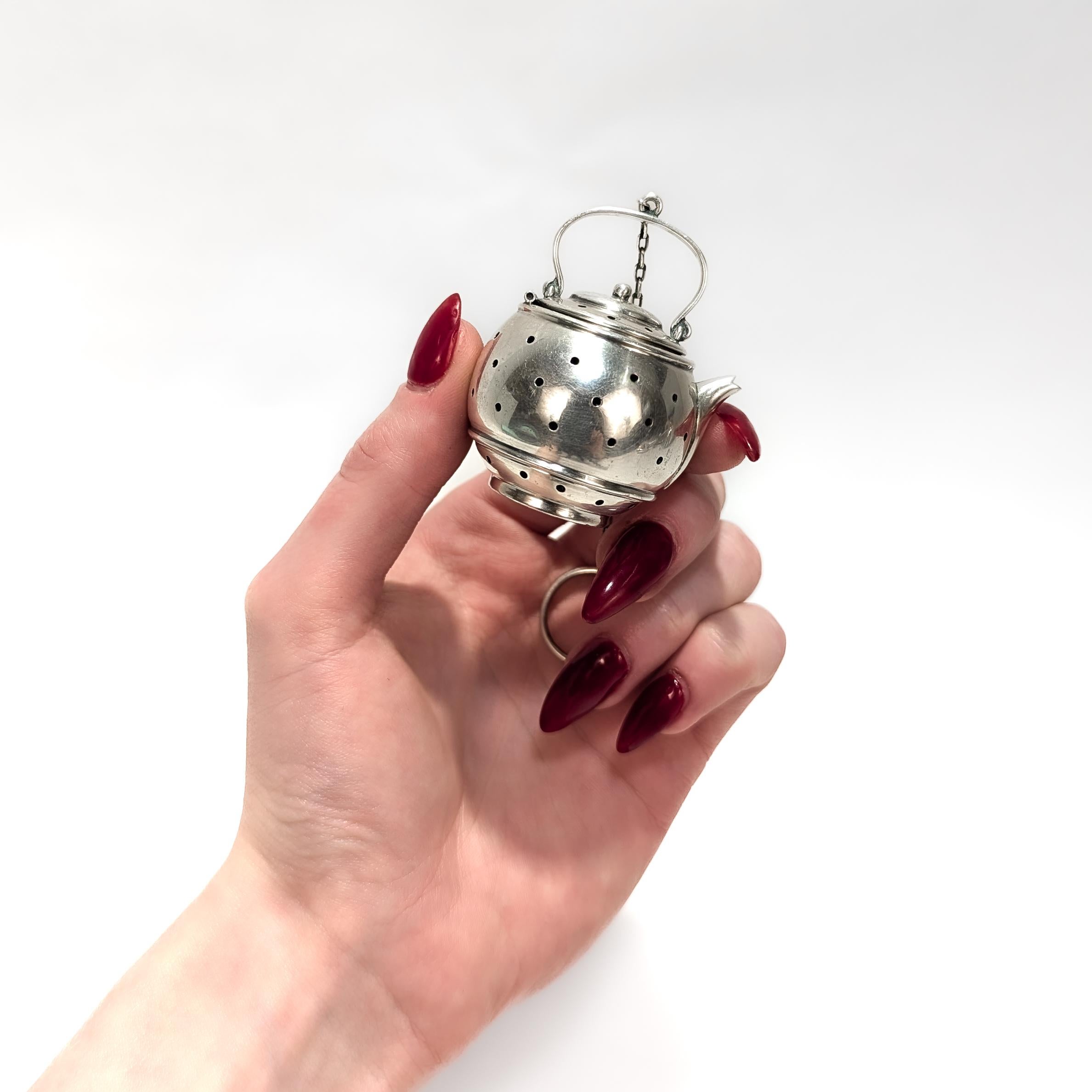 Edwardian Signed Simons Brothers Figural Sterling Silver Miniature Teapot Tea Strainer For Sale