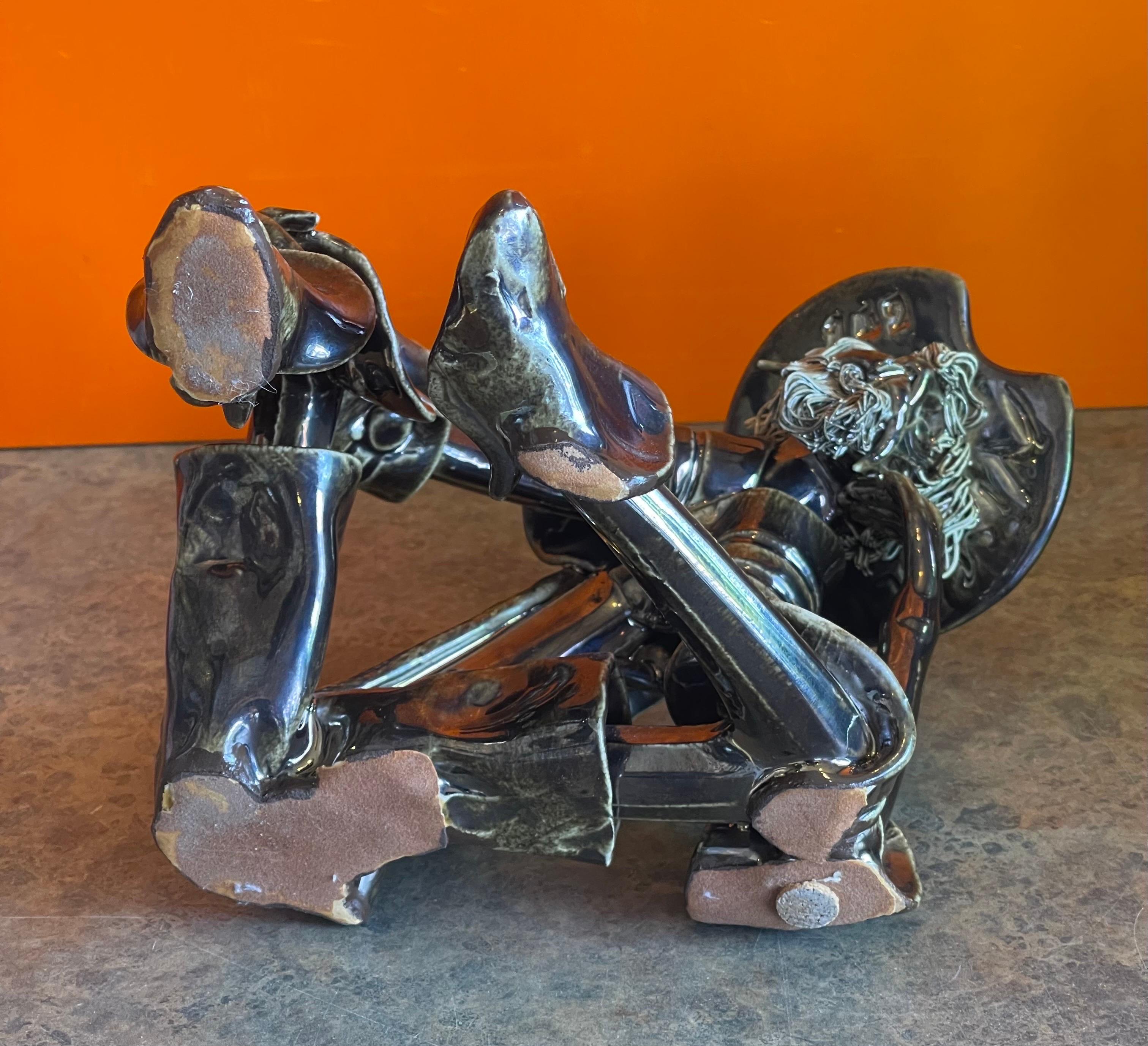 Escultura de Don Quijote firmada por Roberto Nischli 3