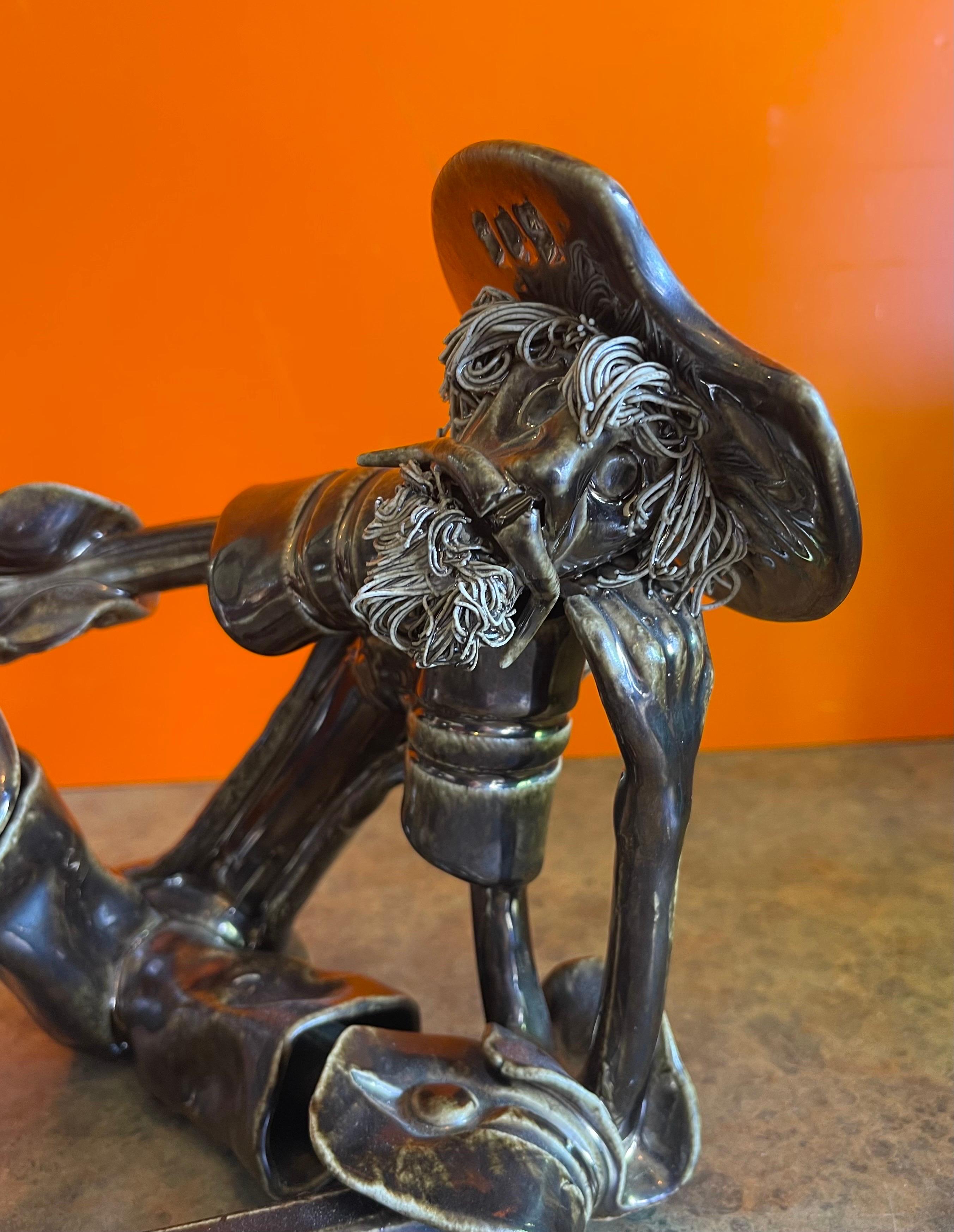 Escultura de Don Quijote firmada por Roberto Nischli 4