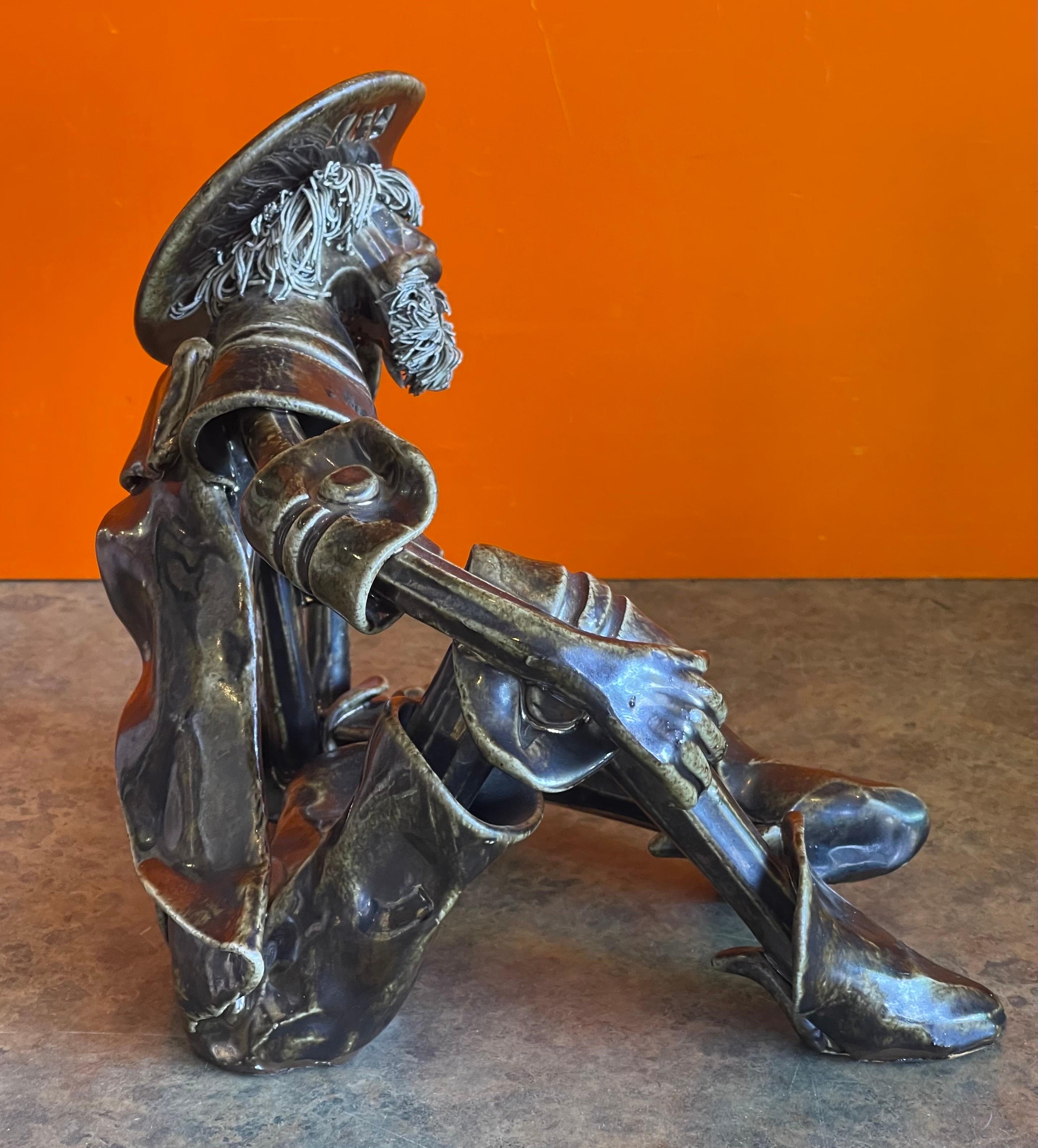 Escultura de Don Quijote firmada por Roberto Nischli siglo XX