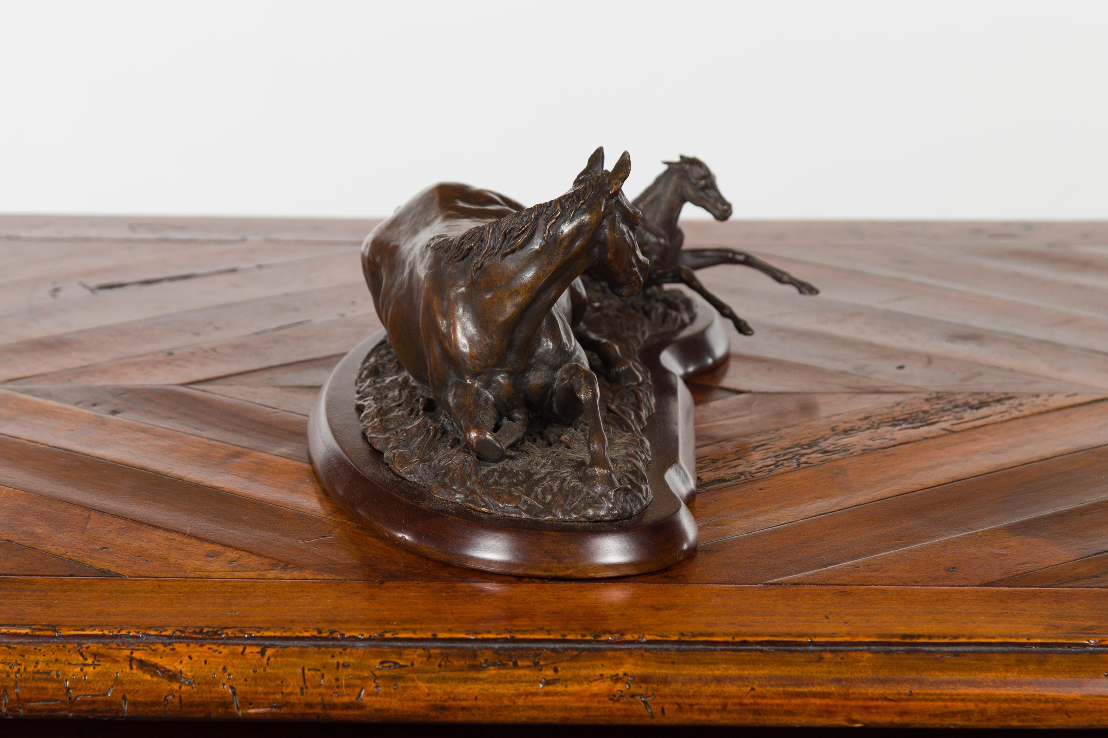 Signed Suzanne Fiedler Cast Bronze Sculpture of a Mare and Her Foal Dated 1974 In Good Condition For Sale In Atlanta, GA