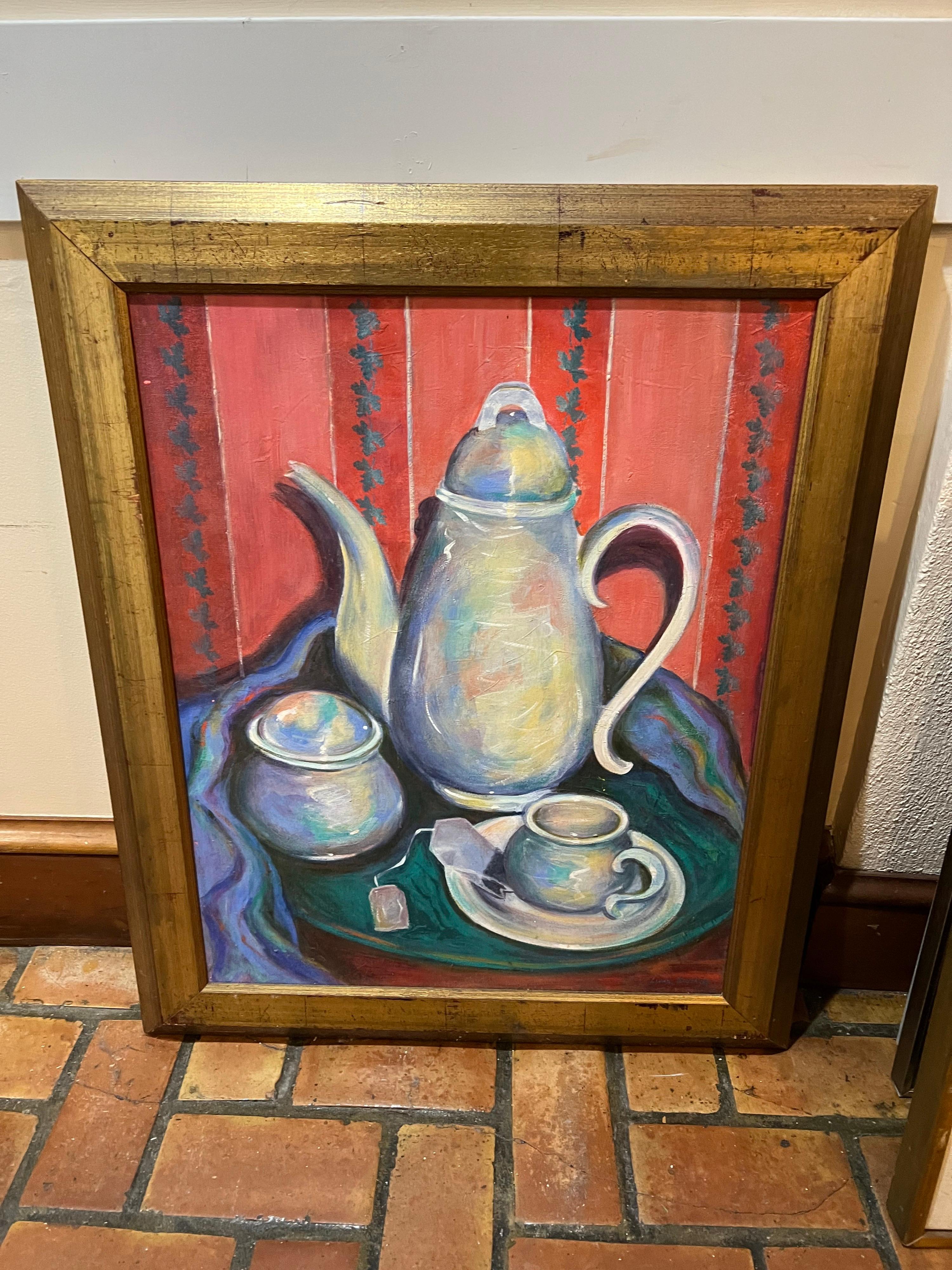 Peinture sur théière signée par Linda Smith. Peinture fantaisiste et colorée d'une théière, d'un sucrier, d'une tasse et d'une soucoupe. Décor parfait pour un salon de thé ou un café. Le livre est présenté dans un cadre épais et solide en bois