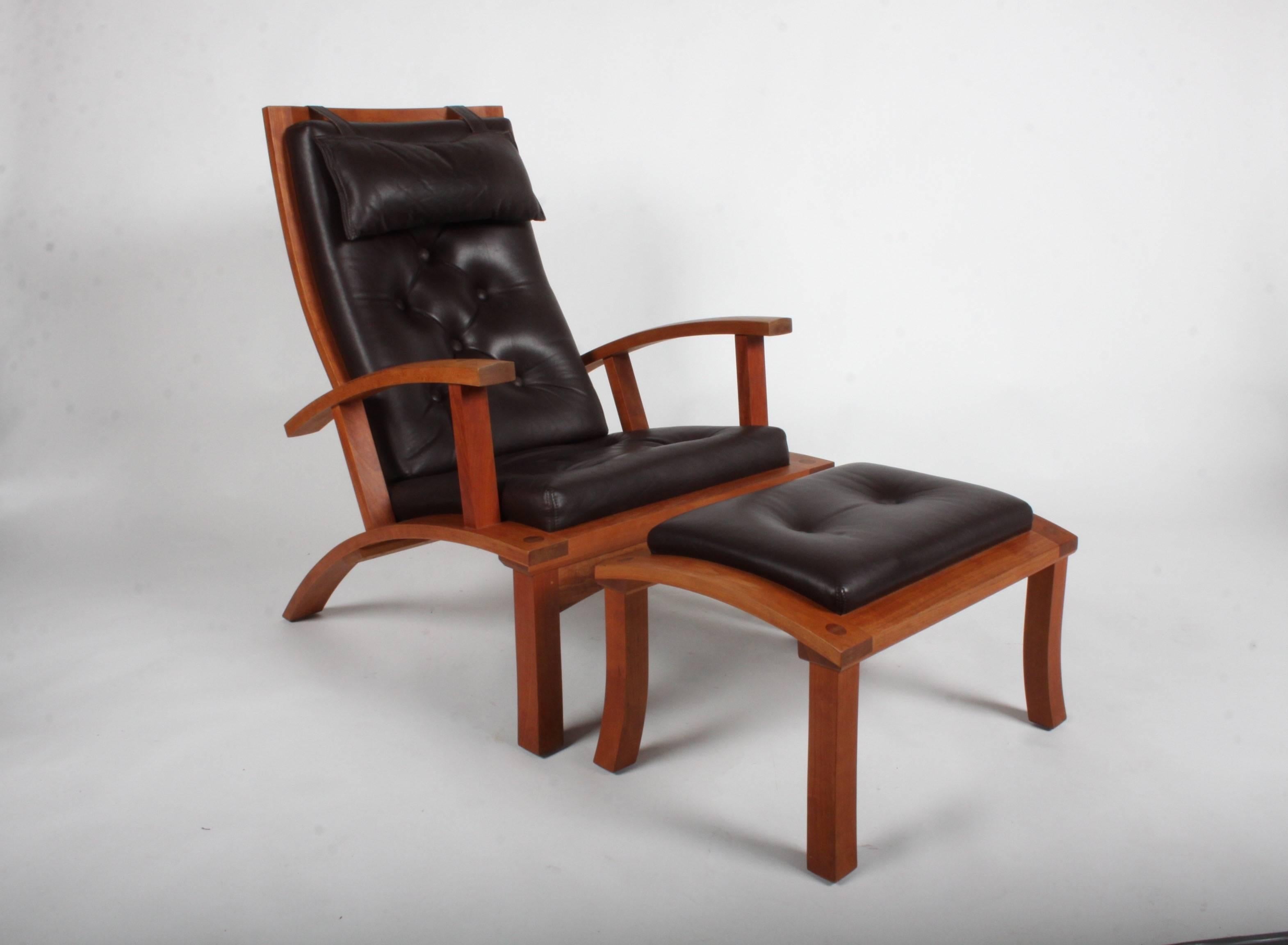 Thos. Moser Lolling adjustable lounge and ottoman in cherry with brown tufted leather. Brown leather is beautiful and shows really no signs of wear, like you would expect. Beautifully crafted in Maine. Chair signed by craftsman Ed. Ckekovsky Jr.