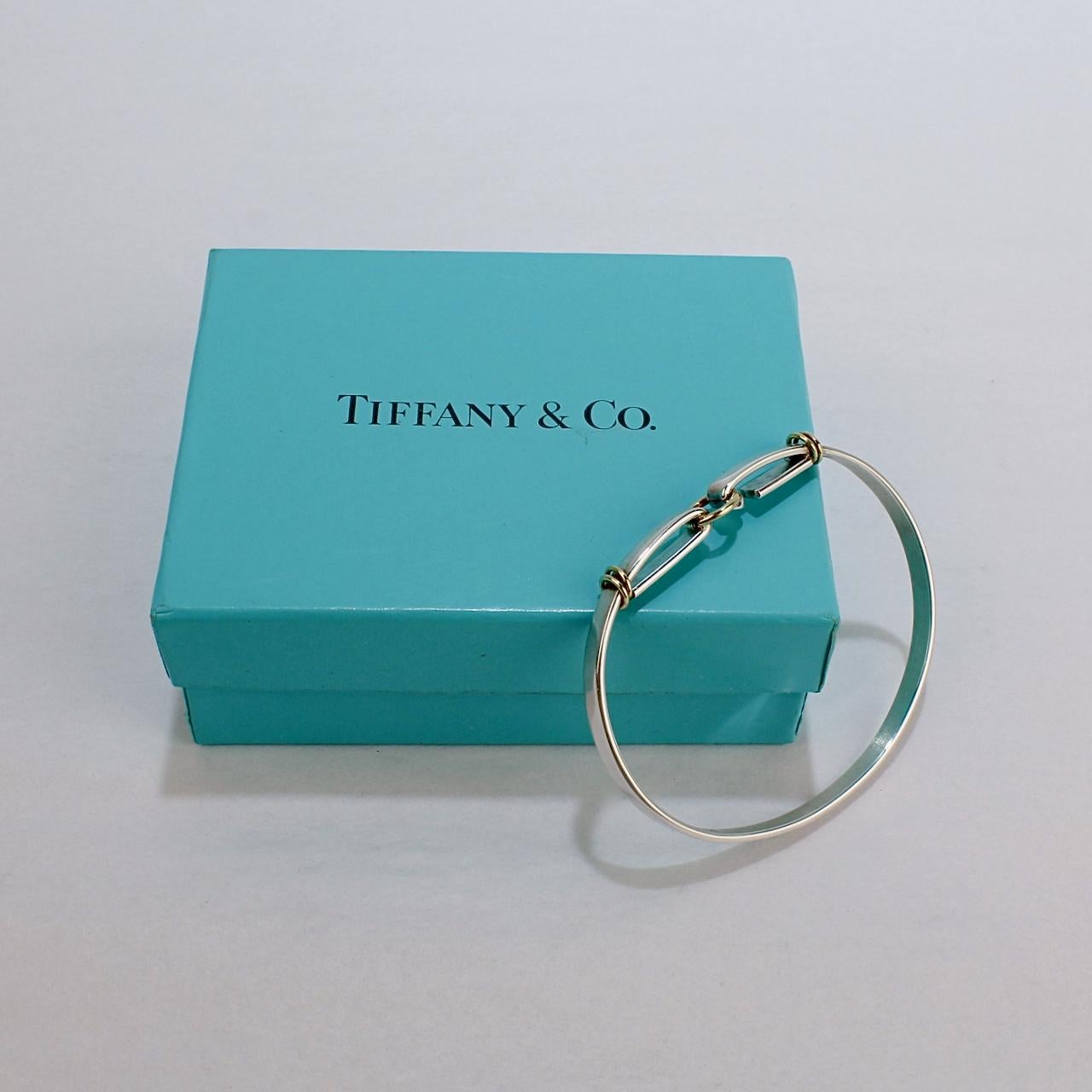 Signed Tiffany & Co. Sterling Silver & 18k Gold Hook and Circle Bangle Bracelet In Good Condition In Philadelphia, PA