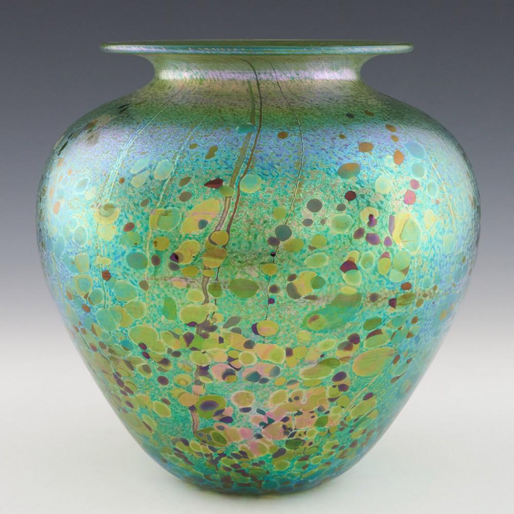 Heading : Isle of Wight 'Summer Fruits Greenberry' baluster vase
Date : 1998-2009
Origin : Isle of Wight
Bowl Features : Iridescent green glass with polychrome abstractly depicted berries
Marks : Signed Timothy Harris to base
Type : Lead
Size :