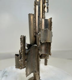 Candélabre en métal sculptural brutaliste taillé au chalumeau signé Marcello Fantoni