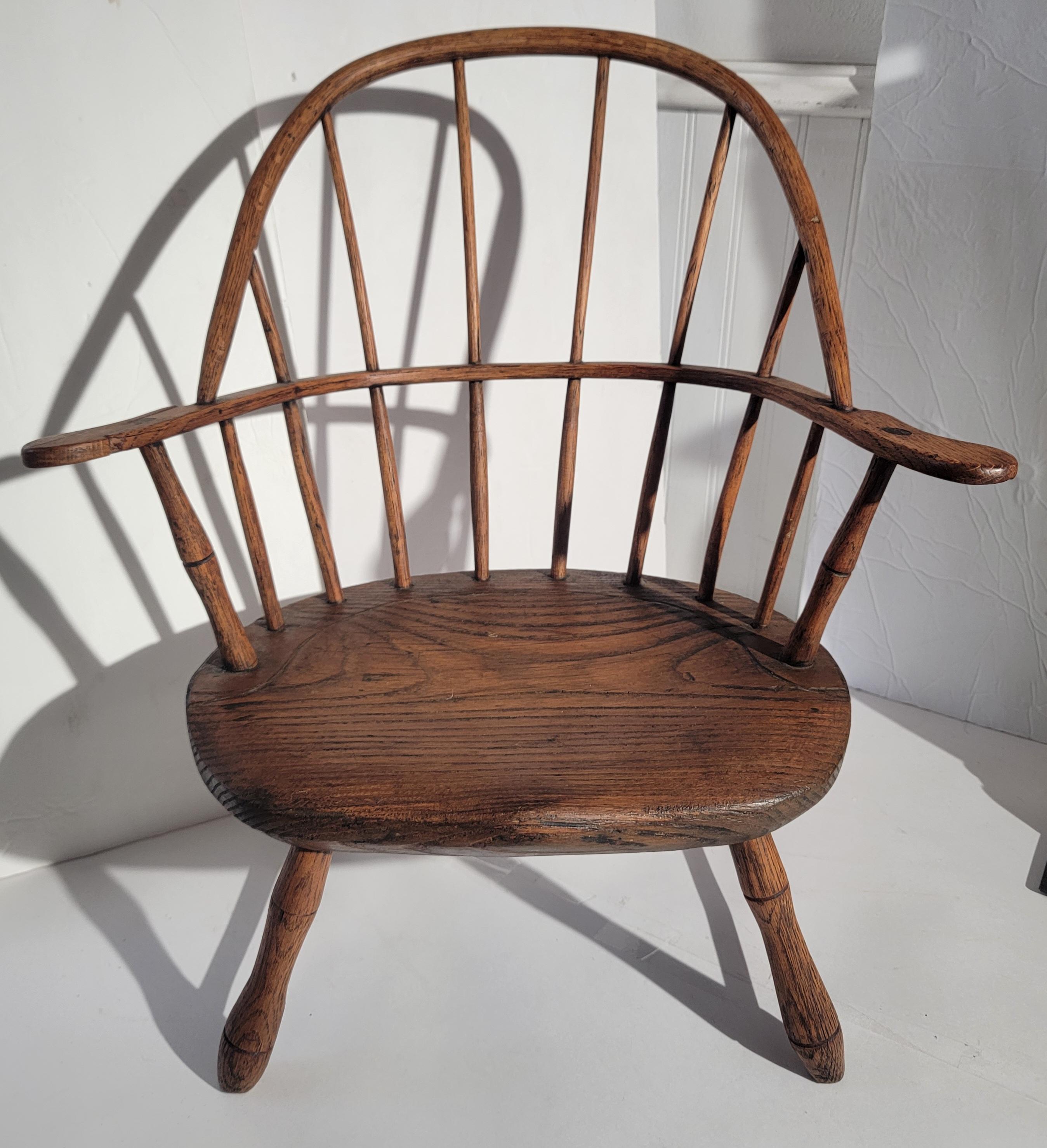 Early 19thc American hand crafted children's extended arm Windsor chair.This signed 