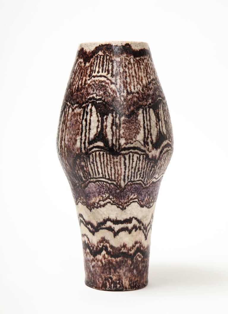 Exquisite ceramic vase by Uberto Zannoni, Italy, c. 1950 (Signed).

This stunning ceramic is hand-painted in earthen brown tones cast against a creamy beige base. Pattern and finish are both signature trademarks of Zannoni, a highly celebrated