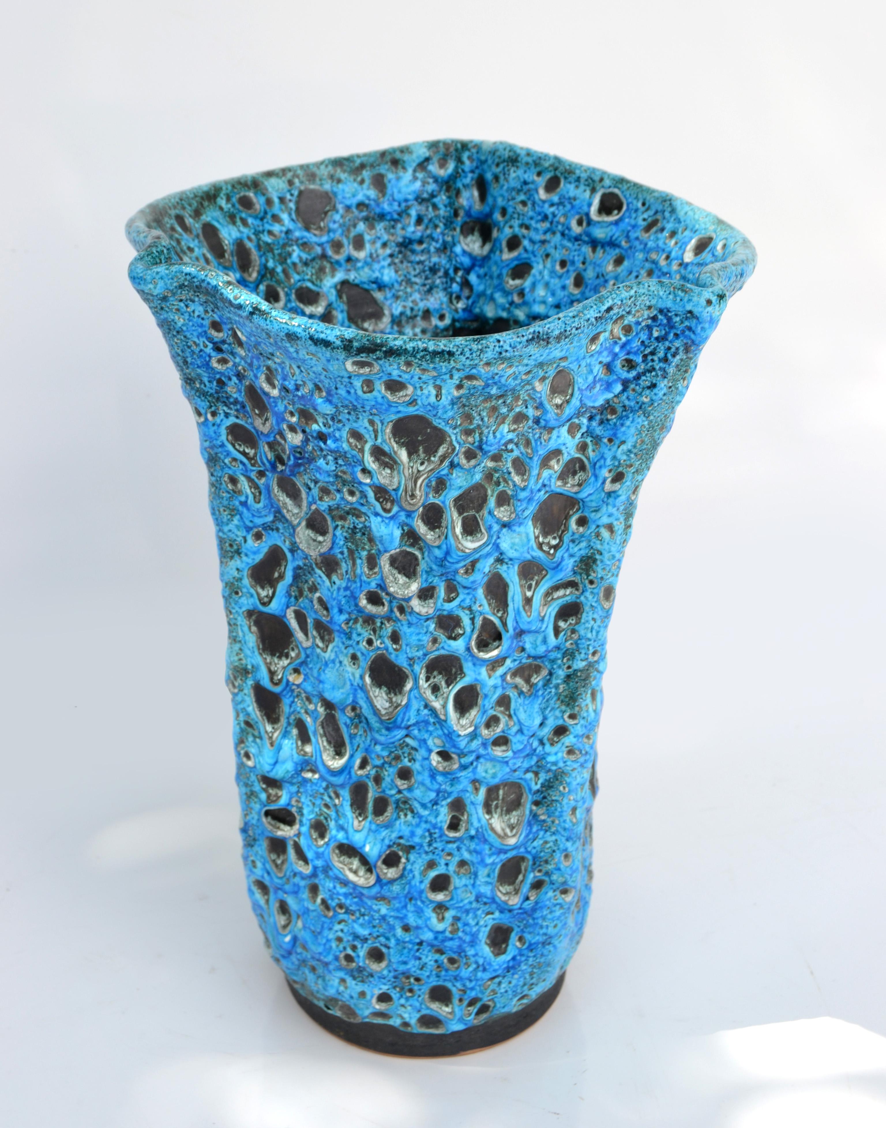 Superb Mid-Century Modern handcrafted drip glazed ceramic vase, vessel, object of Fine Art in hues of blue and black.
Signed underneath Vallauris France.
Vallauris is the famous village on the French Riviera where Picasso, Matisse, Jean Marais