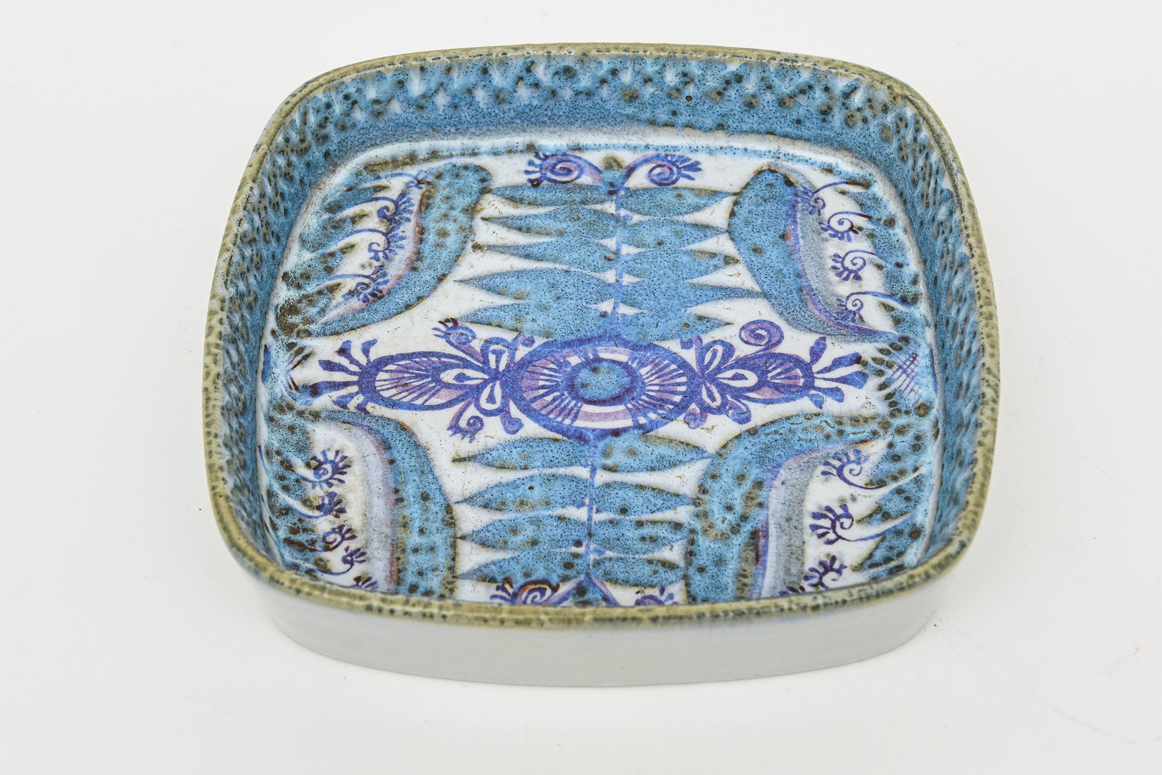 This vintage hallmarked hand painted glazed faience ceramic bowl , dish and or tray is from the 60's and was manufactured by Royal Copenhagen from Denmark. This was a craft known by many but mastered by few in the hand painting of these porcelain