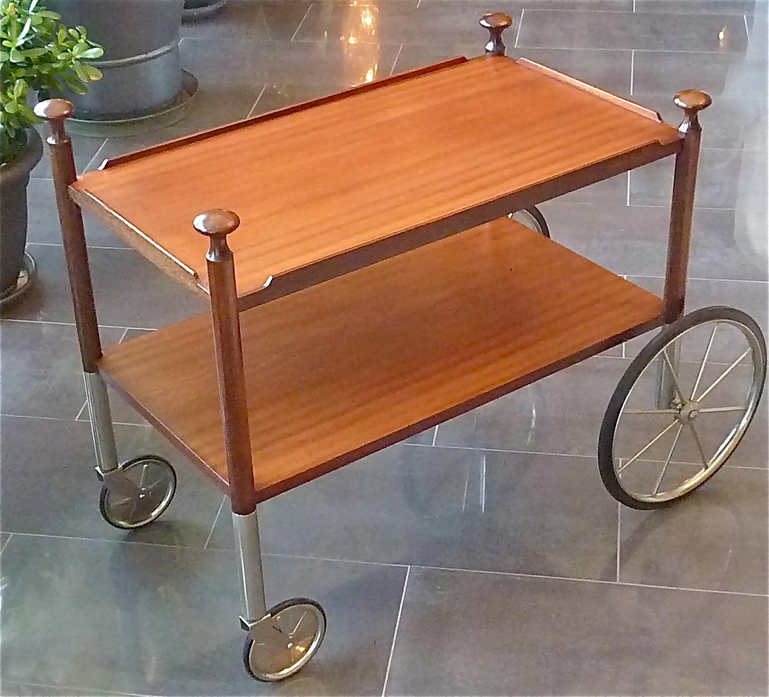 Cool rare midcentury modern bar cart, drinks or serving table or trolley designed by Walter Wirz for Wilhelm Renz, Germany circa 1960s. The beautiful cart is made of solid teak and teak veneer and tropical wood combined with chromed brass nickel