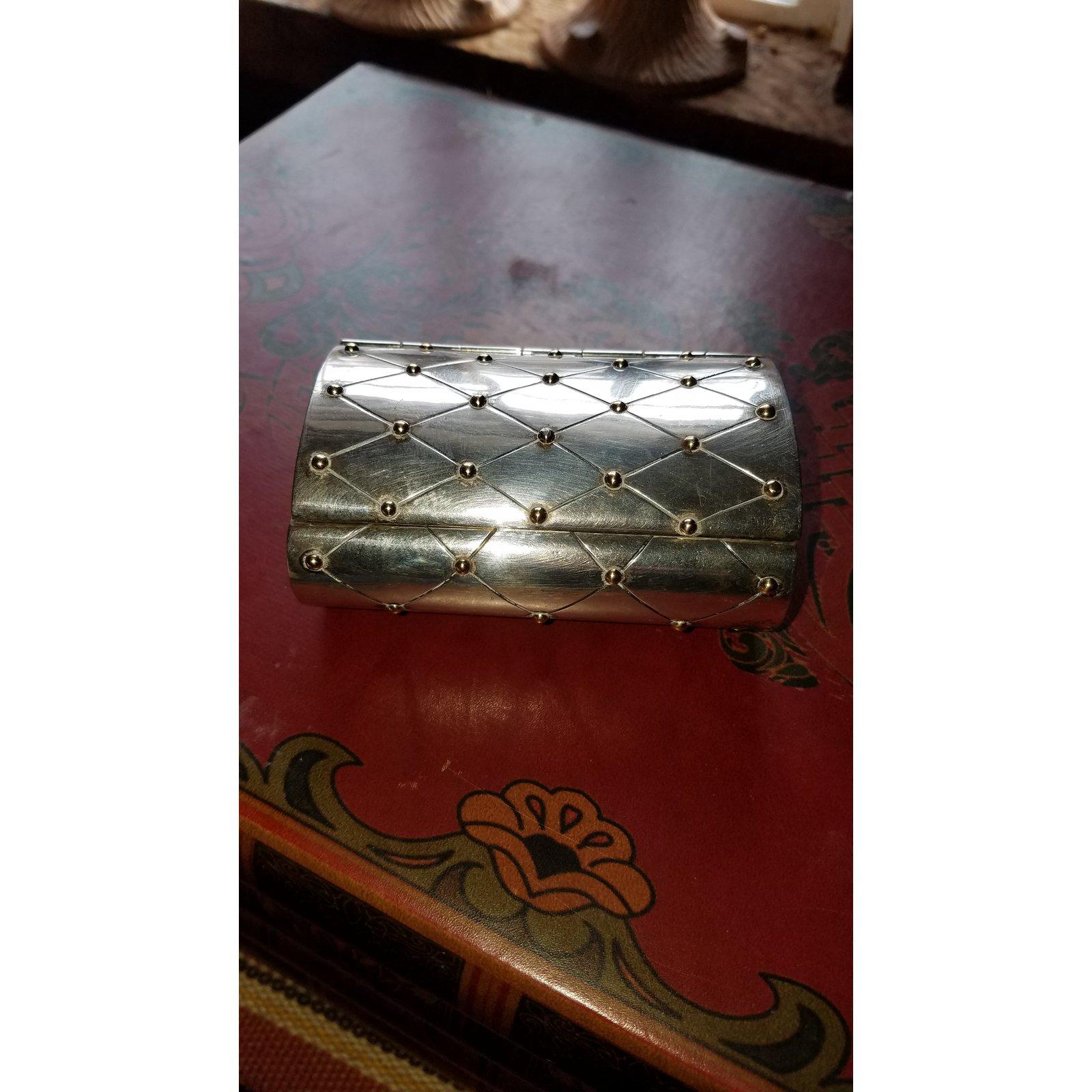 Classic Sterling and gold quilted design box by William Spratling, signed on bottom. The silver background with lattice quilted pattern with gold beads at the corners.