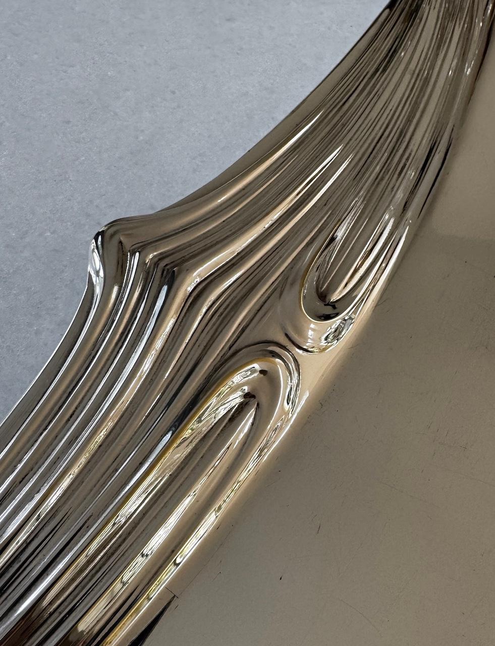 Large Art Nouveau serving tray fully hallmarked with the WMF Ostrich stamp partly erased, xo and 1/0. These WMF (Württembergische Metallwarenfabrik) marks were introduced in 1903 and used until 1910. This is an outstanding metal work with feminine