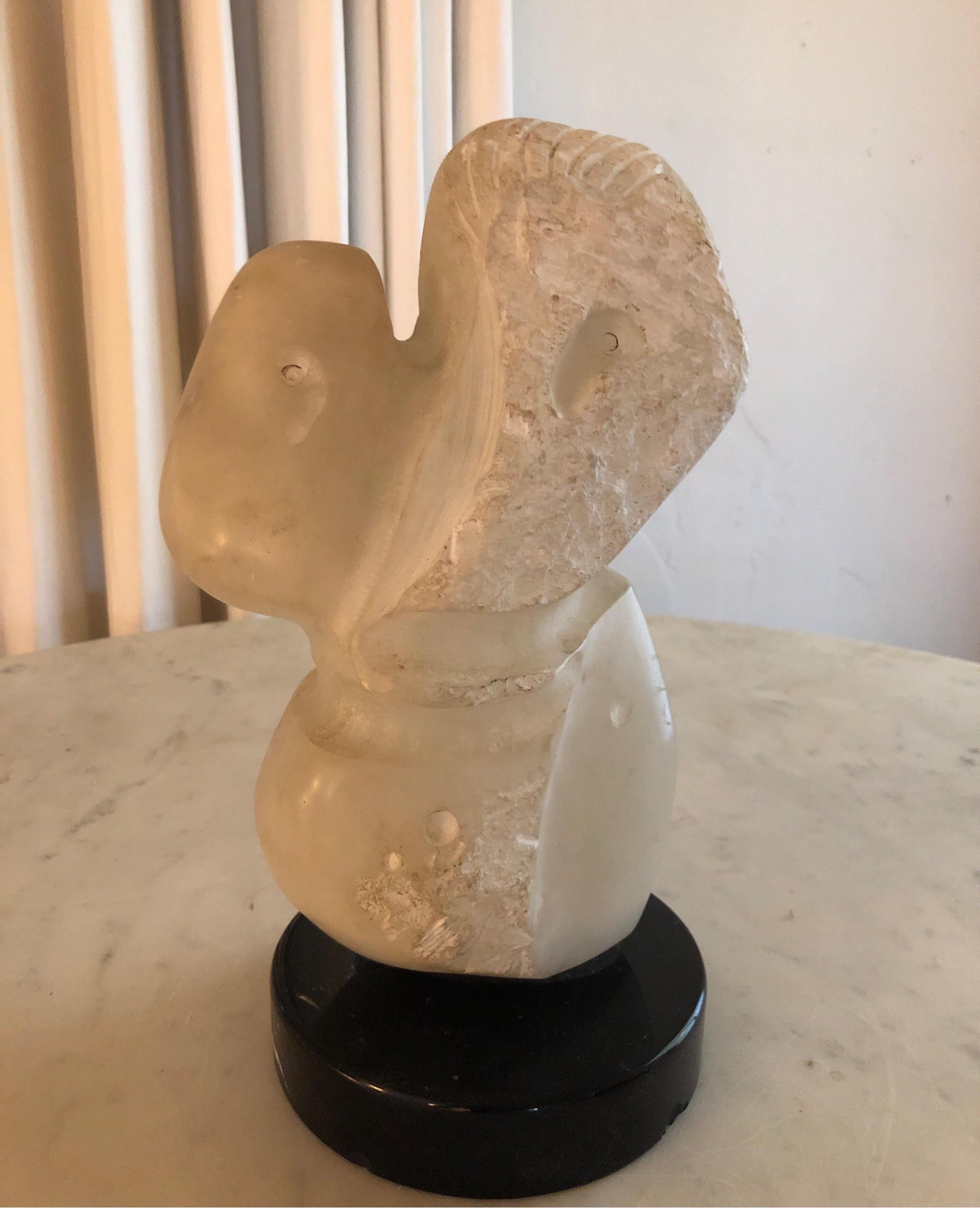 Unique Mid-Century Modern white marble stone sculpture mounted on black marble base.
Signed by American artist Yehuda 