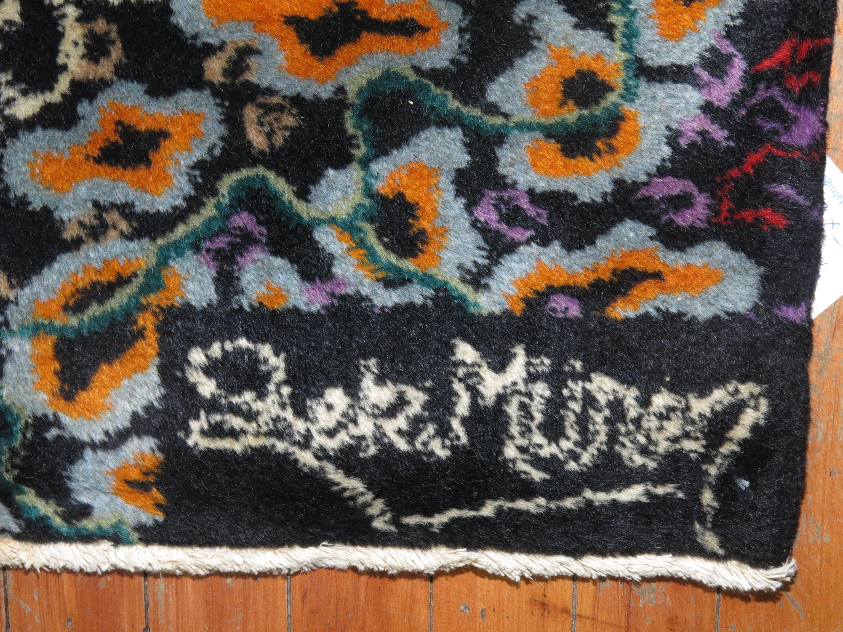 Turkish Zeki Muren rug with a lovely all-over border less design with zeki muren signature on 1 end and Turkish quote 