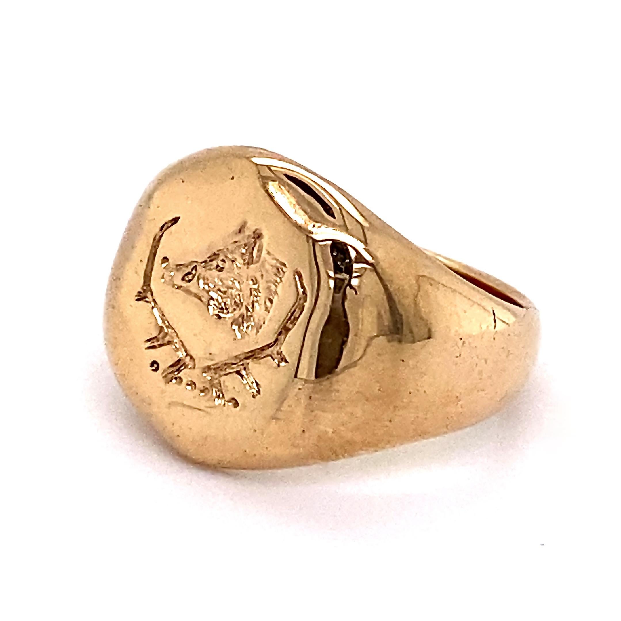 This appealing little ring features a couped snaggle-toothed boar's head in profile, facing left, surrounded by a pair of branches.  The design is devoid of quarters, partitions, mottos, mantles or any of the other heraldic doo-dads that make up a