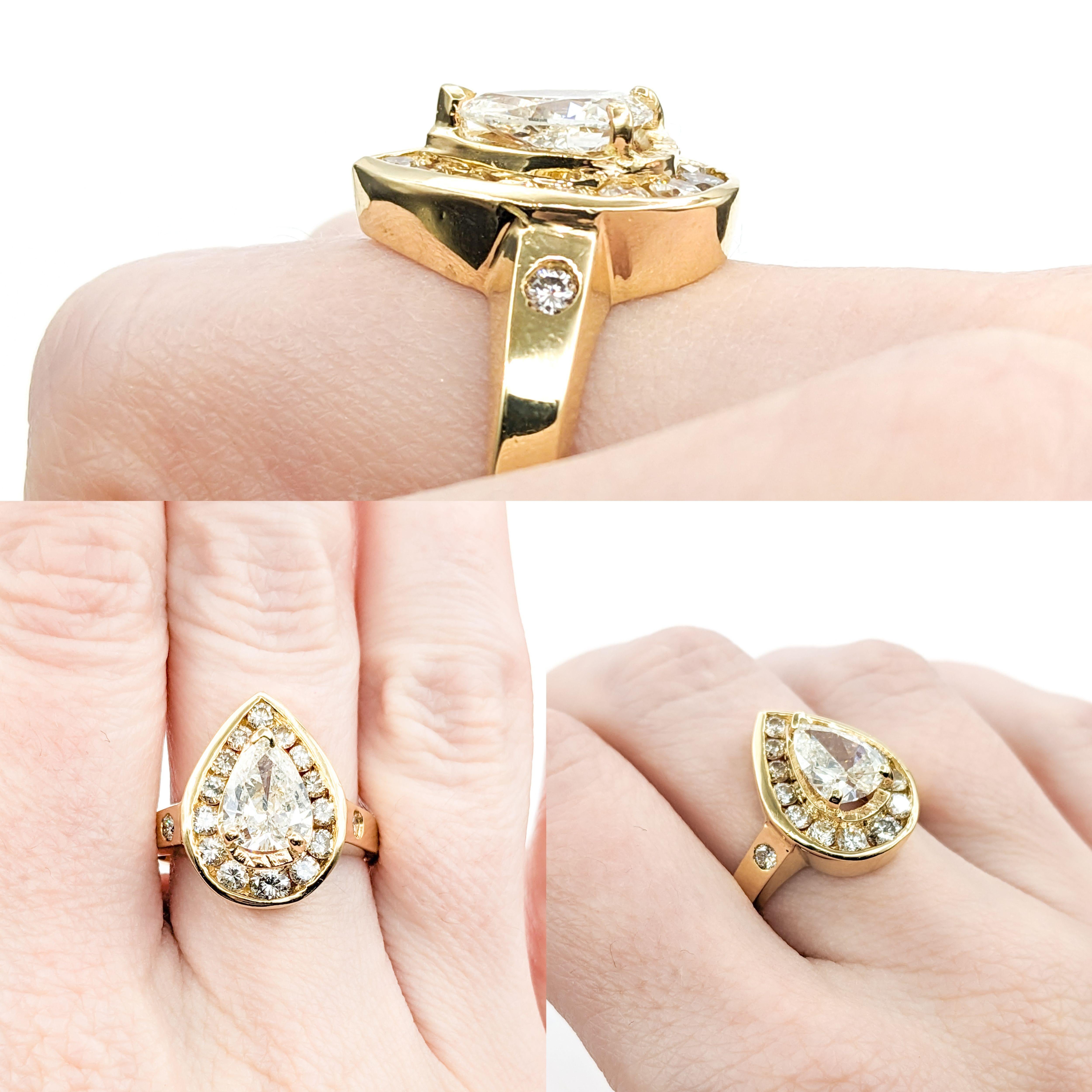 Significant 18k 1.60ct Pear Cut Halo Diamond Ring

Indulge in the exquisite beauty of our meticulously crafted 18k yellow gold ring. This stunning piece showcases a magnificent 1.60ct pear cut diamond at its center, radiating brilliance and