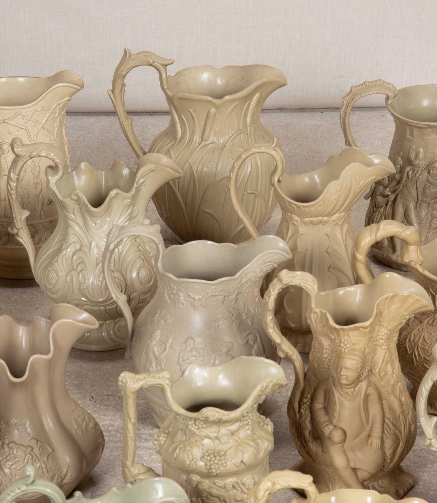 English Significant Collection of Victorian Relief Moulded Jugs For Sale