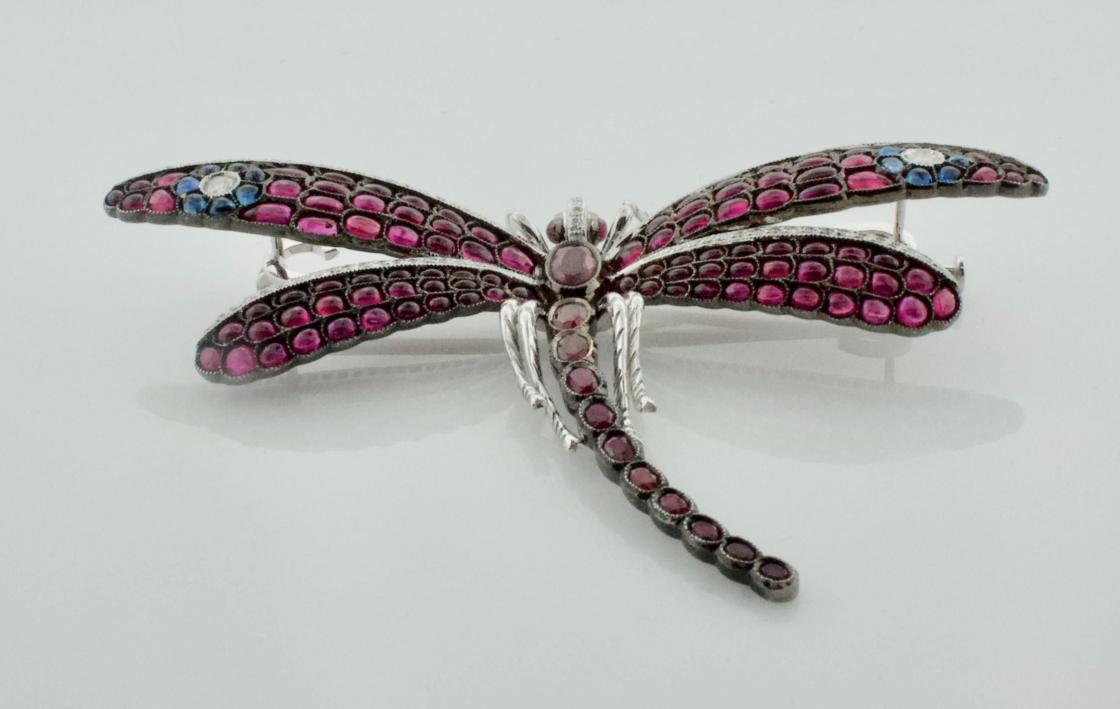 Round Cut Significant Dragonfly Brooch with Rubies, Sapphires and Diamonds in 18 Karat For Sale