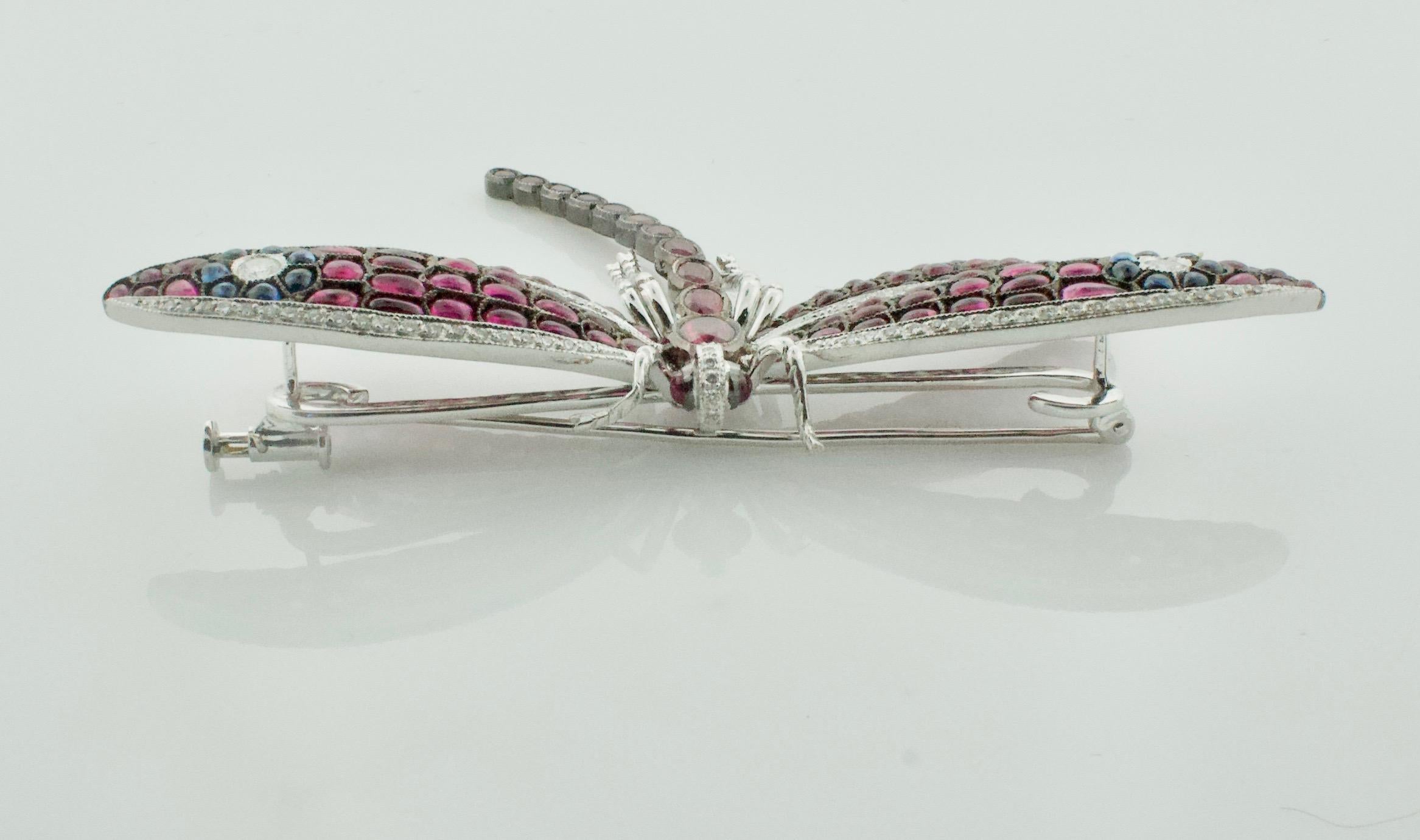 Women's or Men's Significant Dragonfly Brooch with Rubies, Sapphires and Diamonds in 18 Karat For Sale