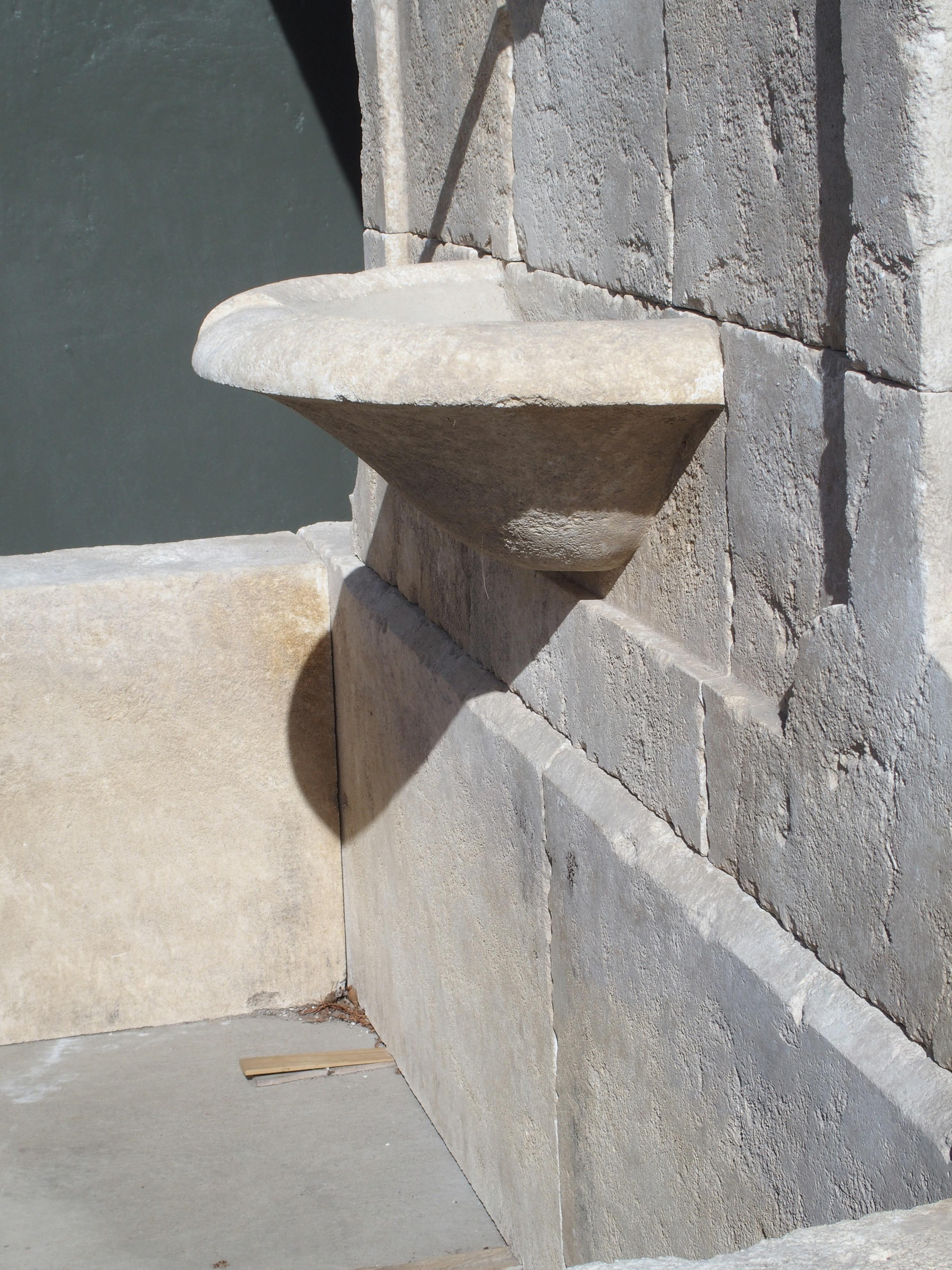French Sigonce Large Carved Spill Bowl Limestone Wall Fountain from Provence, France For Sale