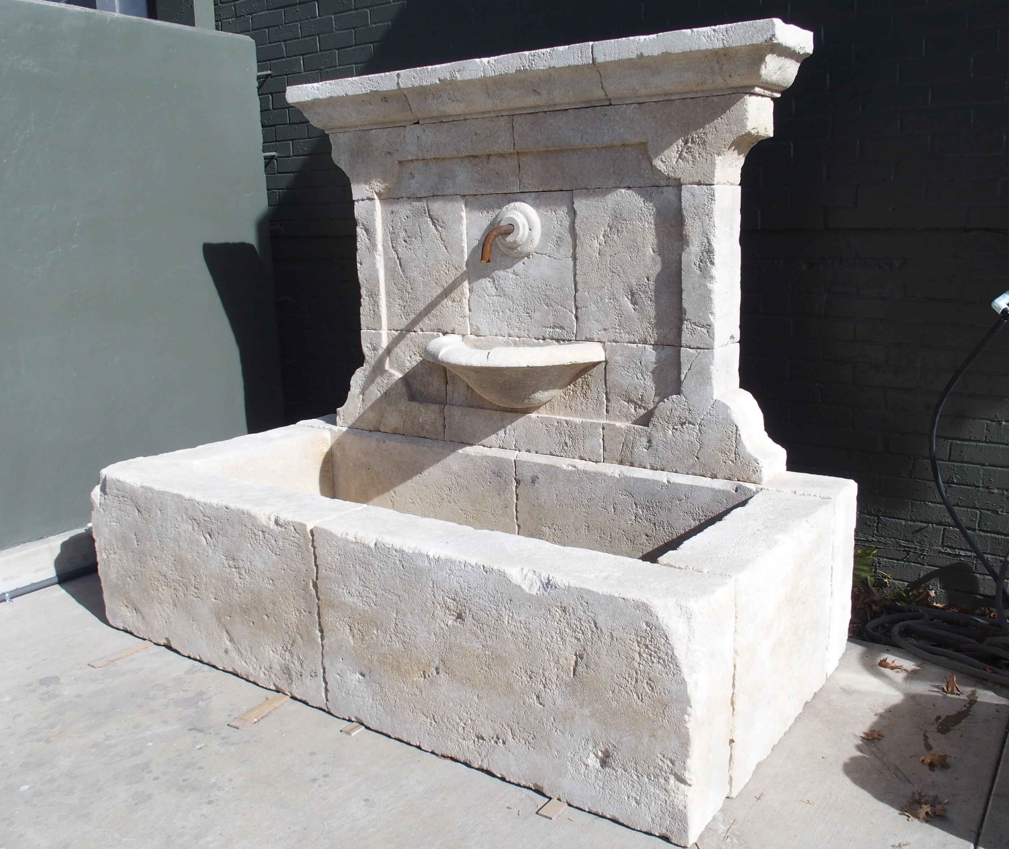 Hand-Carved Sigonce Large Carved Spill Bowl Limestone Wall Fountain from Provence, France For Sale