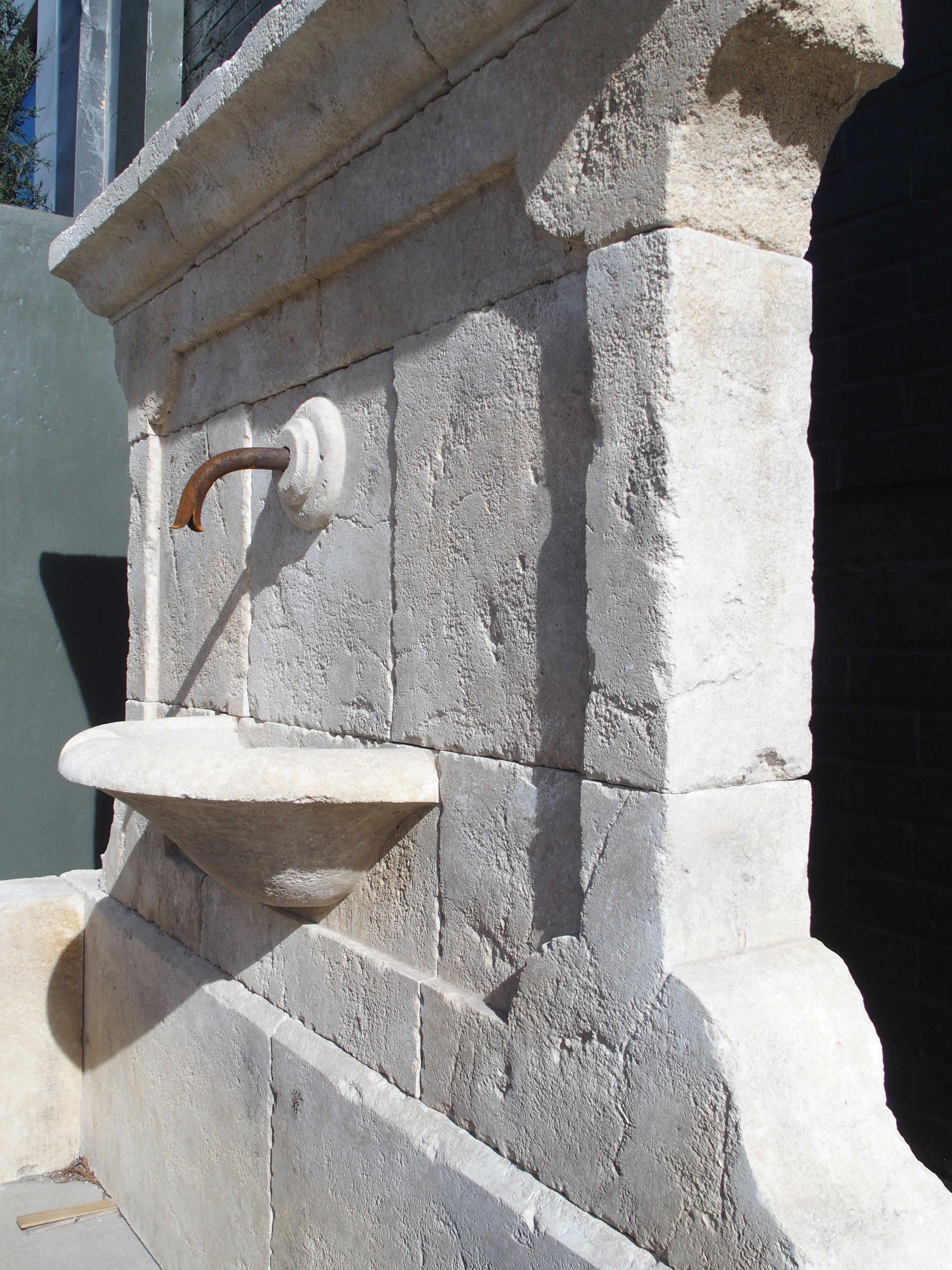 Contemporary Sigonce Large Carved Spill Bowl Limestone Wall Fountain from Provence, France For Sale