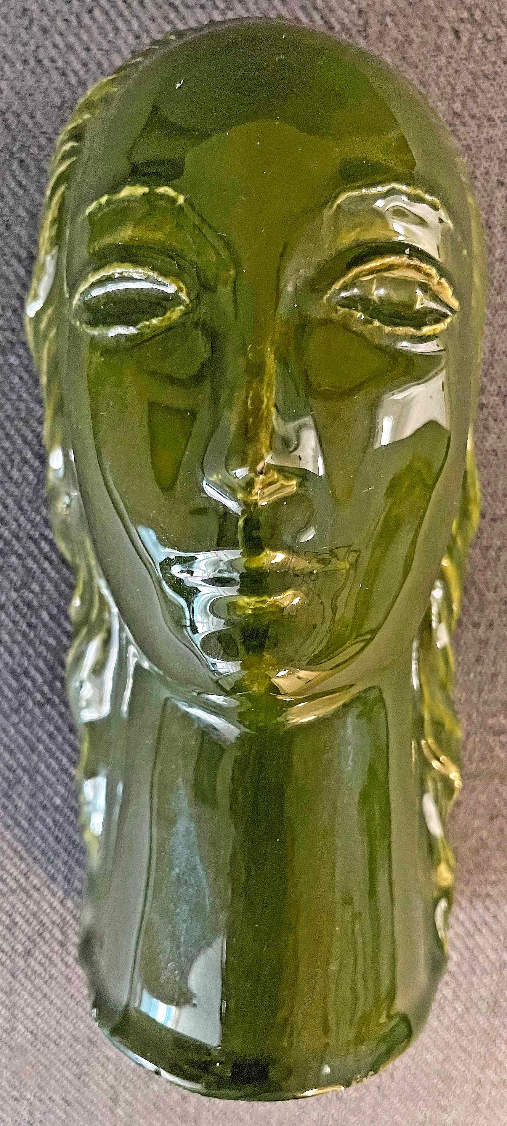 A striking example of Art Deco ceramic sculpture, this female head was made by David Seyler for the Harold Bopp Pottery in northern Kentucky, in the brief period before it became the Kenton Hills pottery in 1940. Bopp had been the superintendent of