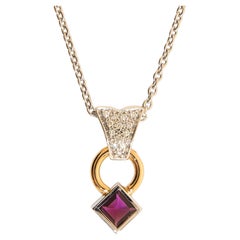 Ciondolo "Reflection" in oro bianco e rosa con Brillianti H SI 1 e Tormalina.