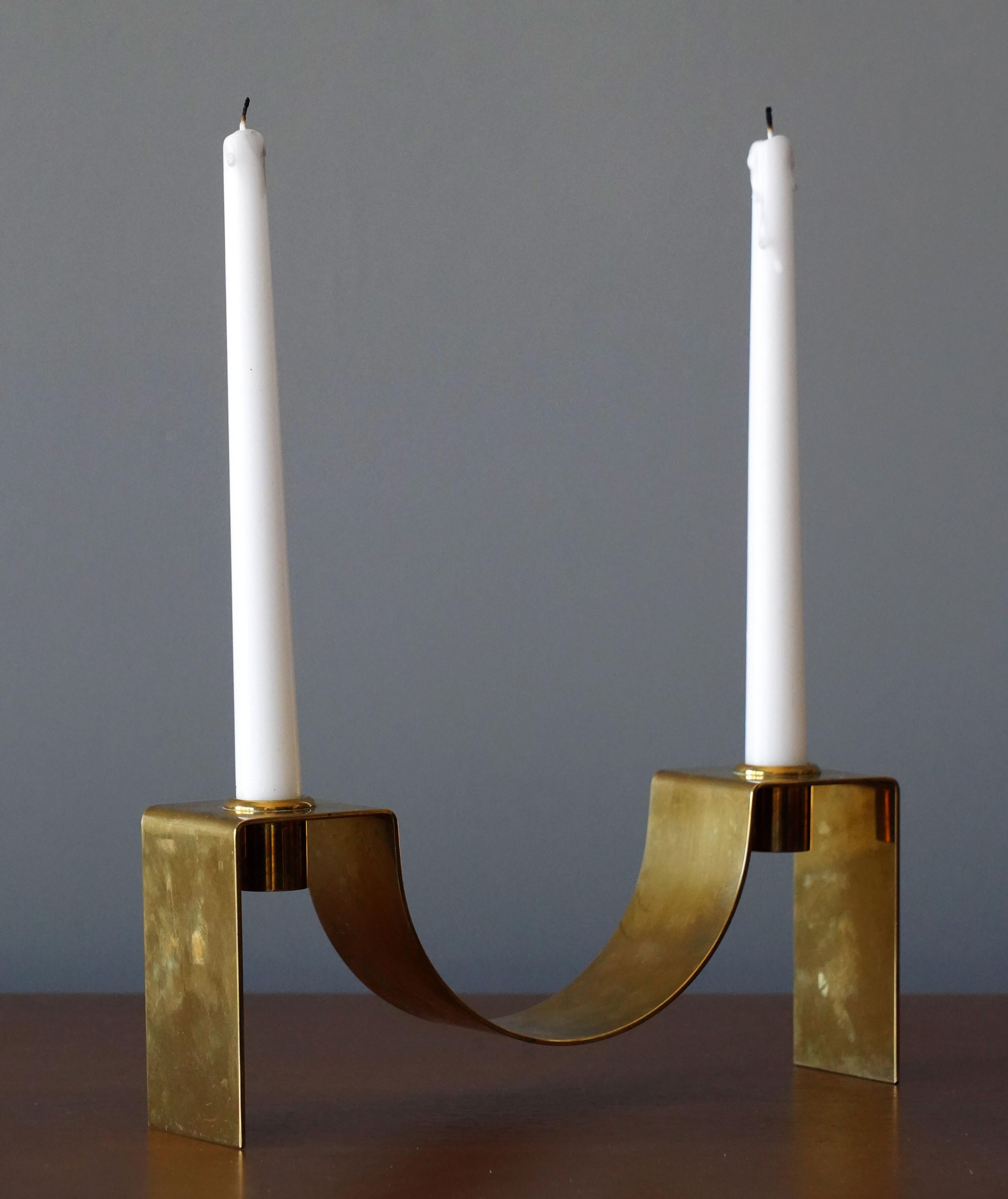 A rare candlestick / candleholder. Designed and produced by Swedish / Finnish silversmith and designer Sigurd Persson (1914-2003).

Other designers of the period include Josef Frank, Estrid Ericsson, Paavo Tynell, Hans-Agne Jacobsen, and Alvar