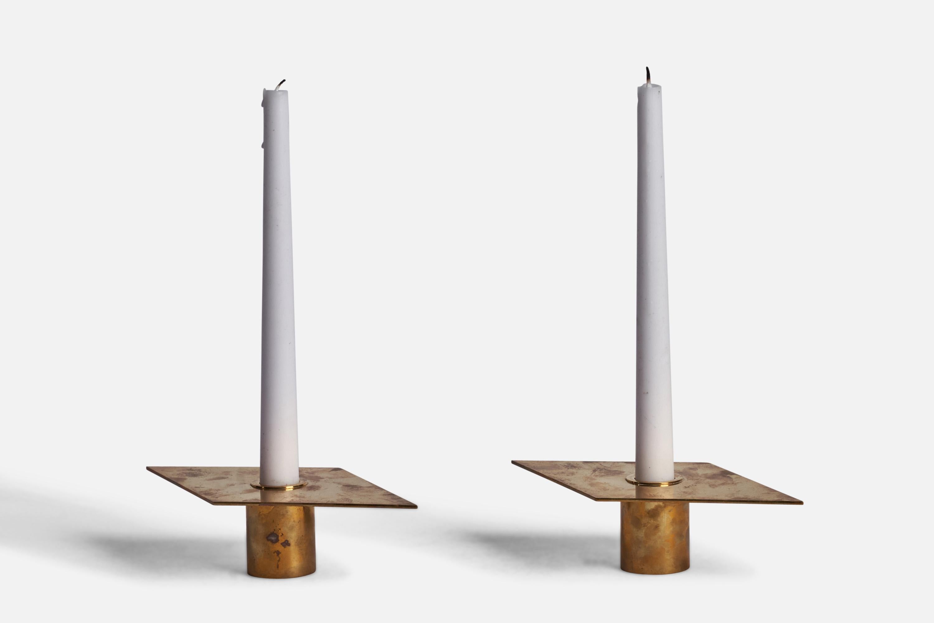 A pair of brass candlesticks designed and produced by Sigurd Persson, Sweden, 1950s.

Fits 0.8” diameter candles