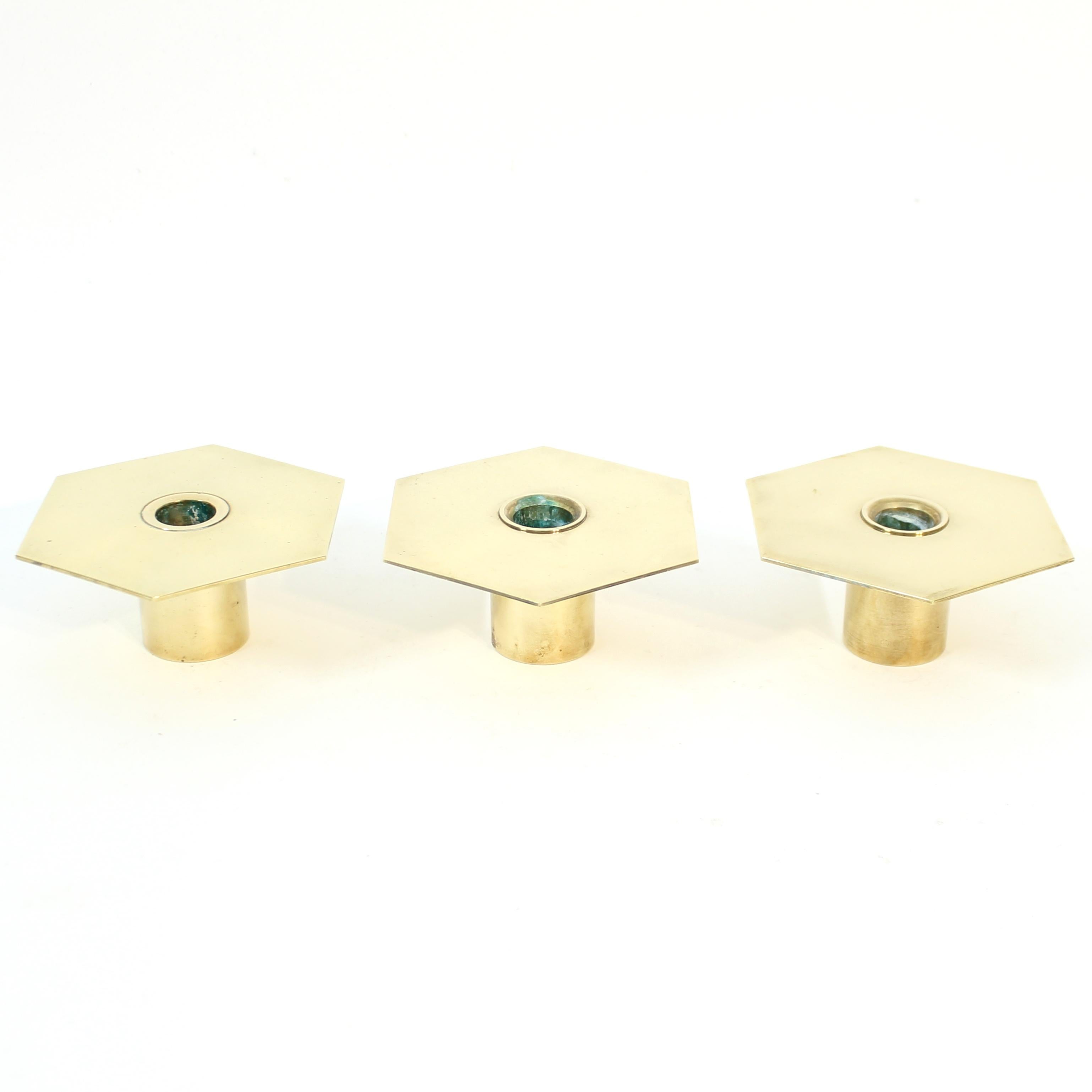 Set of three Romb candle holders designed by Sigurd Persson for his own company. This design was created by Sigurd in 1985 but has a clear mid-century modernist vibe that was very popular in the 1960s even though they saw the light of day in the