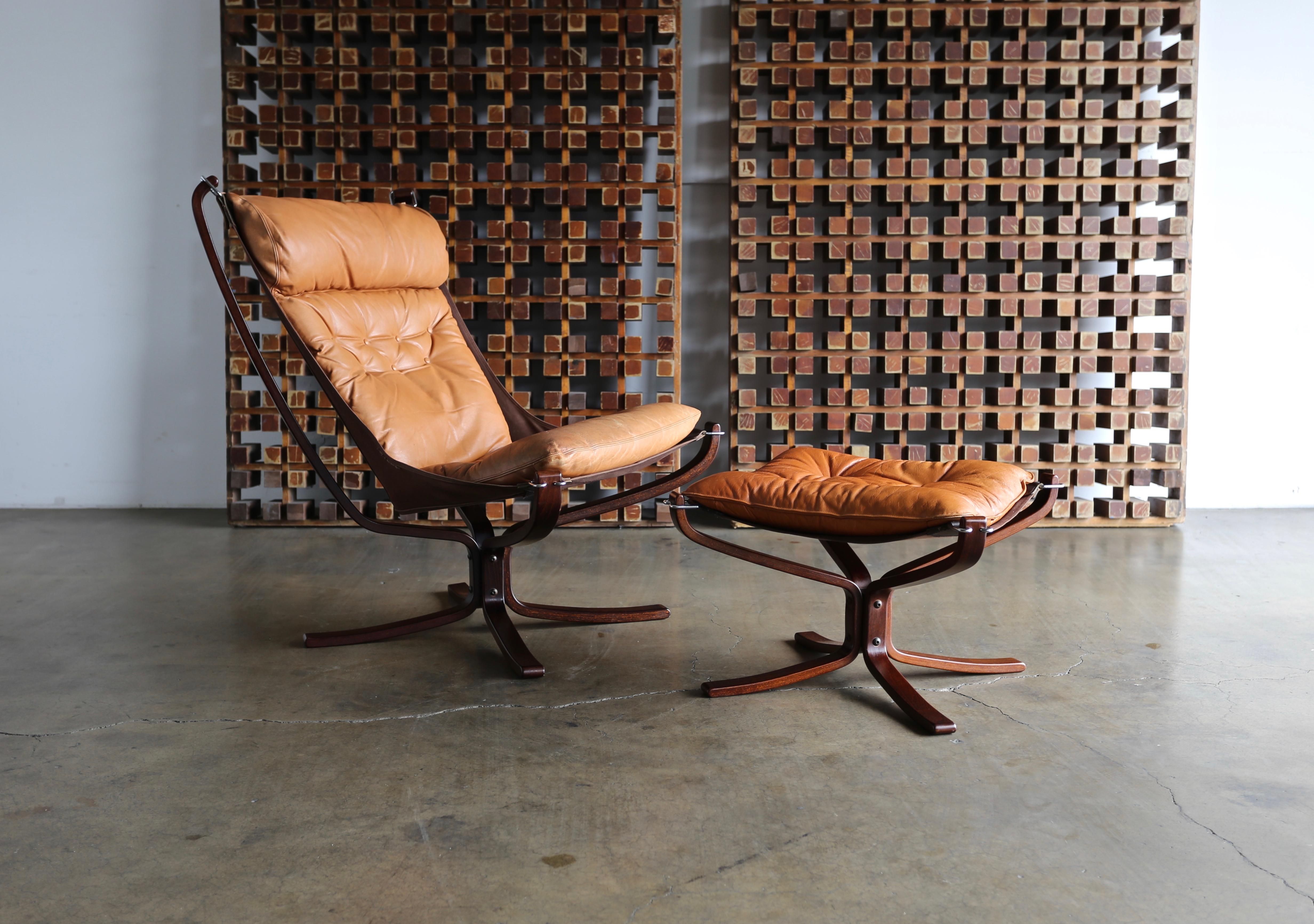 Sigurd Ressell falcon high back sling lounge chair and ottoman by Vatne Mobler, circa 1975.

The lounge chair measures 31
