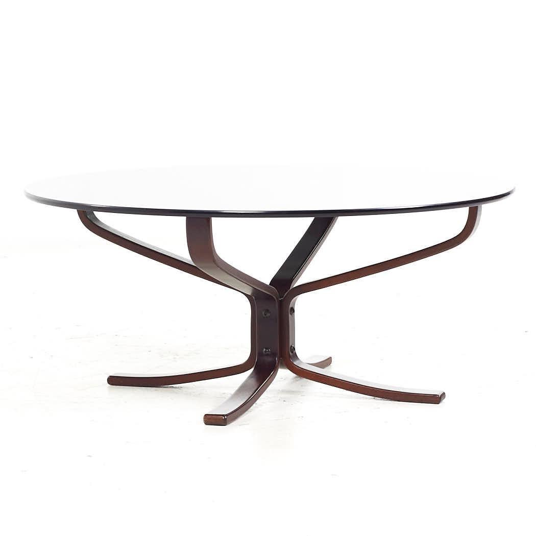 Sigurd Ressell for Vatne Mobler Mid Century Danish Round Coffee Table

This coffee table measures: 35.5 wide x 35.5 deep x 15.25 inches high

All pieces of furniture can be had in what we call restored vintage condition. That means the piece is