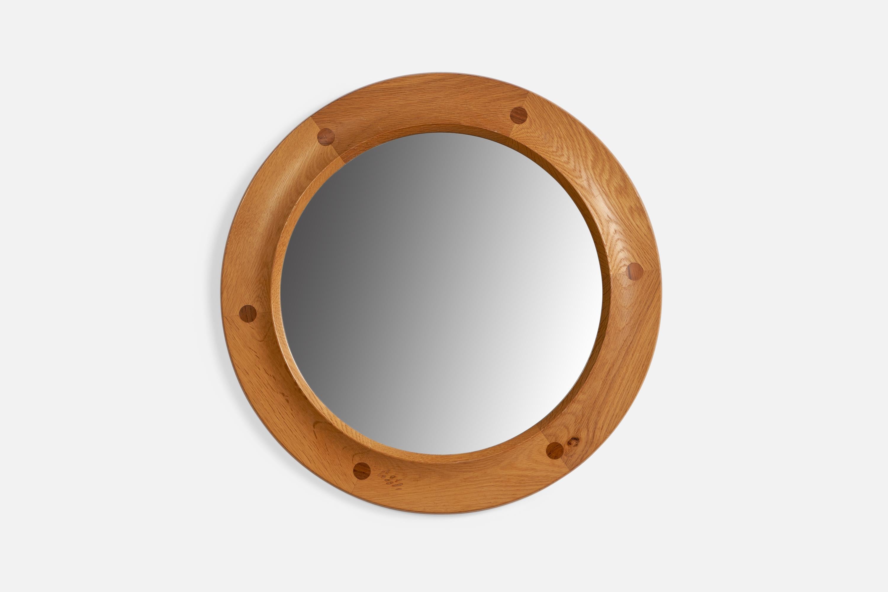 An oak and teak inlay mirror designed by Sigvard Bernadotte & Acton Bjørn, produced by Fröseke, Sweden, c. 1960s.