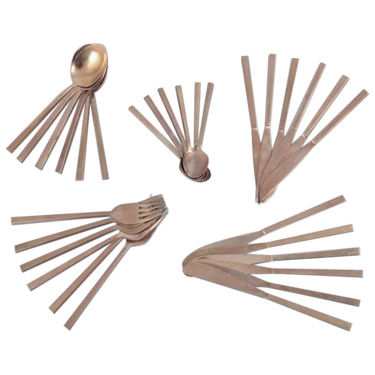 Sigvard Bernadotte "Scanline" brass flatware. Six-person dinner set. 30 pieces