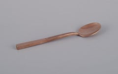 Sigvard Bernadotte 'Scanline' cutlery set in brass. Ten spoons. 1960s/70s