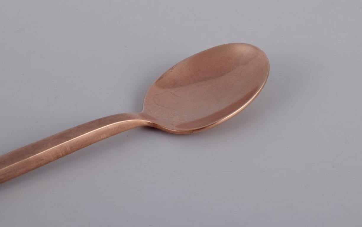 Danish Sigvard Bernadotte 'Scanline' cutlery set in brass. Ten spoons. 1960s/70s