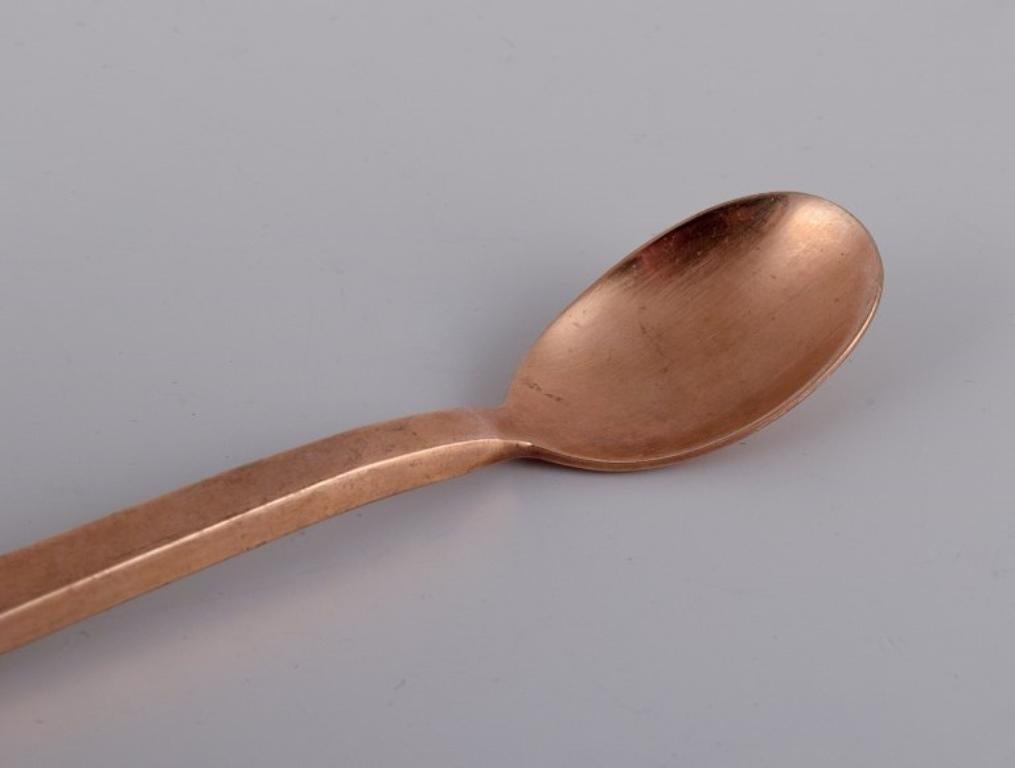 Sigvard Bernadotte 'Scanline' cutlery set in brass. Ten spoons. 1960s/70s In Excellent Condition For Sale In Copenhagen, DK