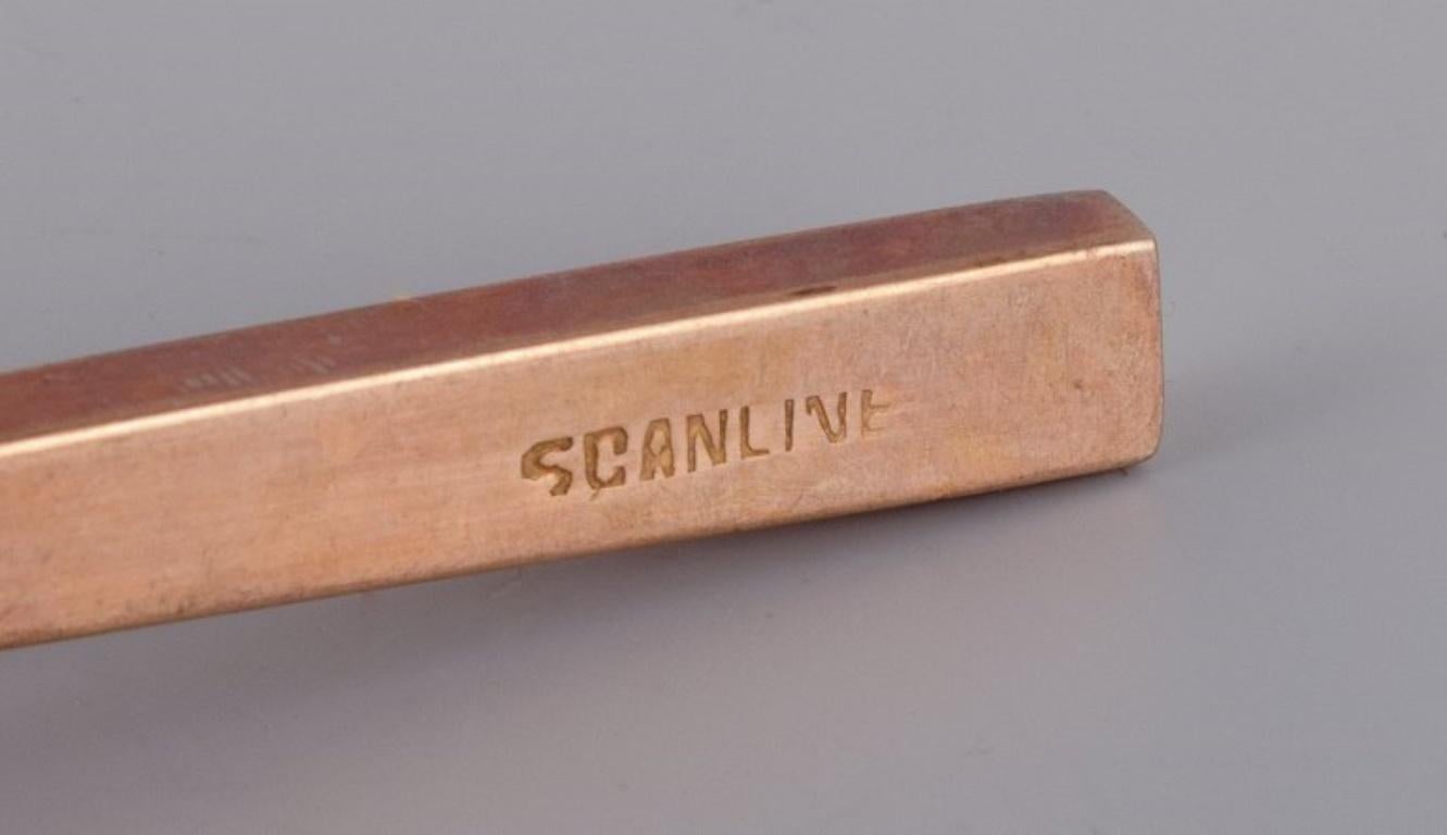 Mid-20th Century Sigvard Bernadotte 'Scanline' cutlery set in brass. Ten spoons. 1960s/70s For Sale