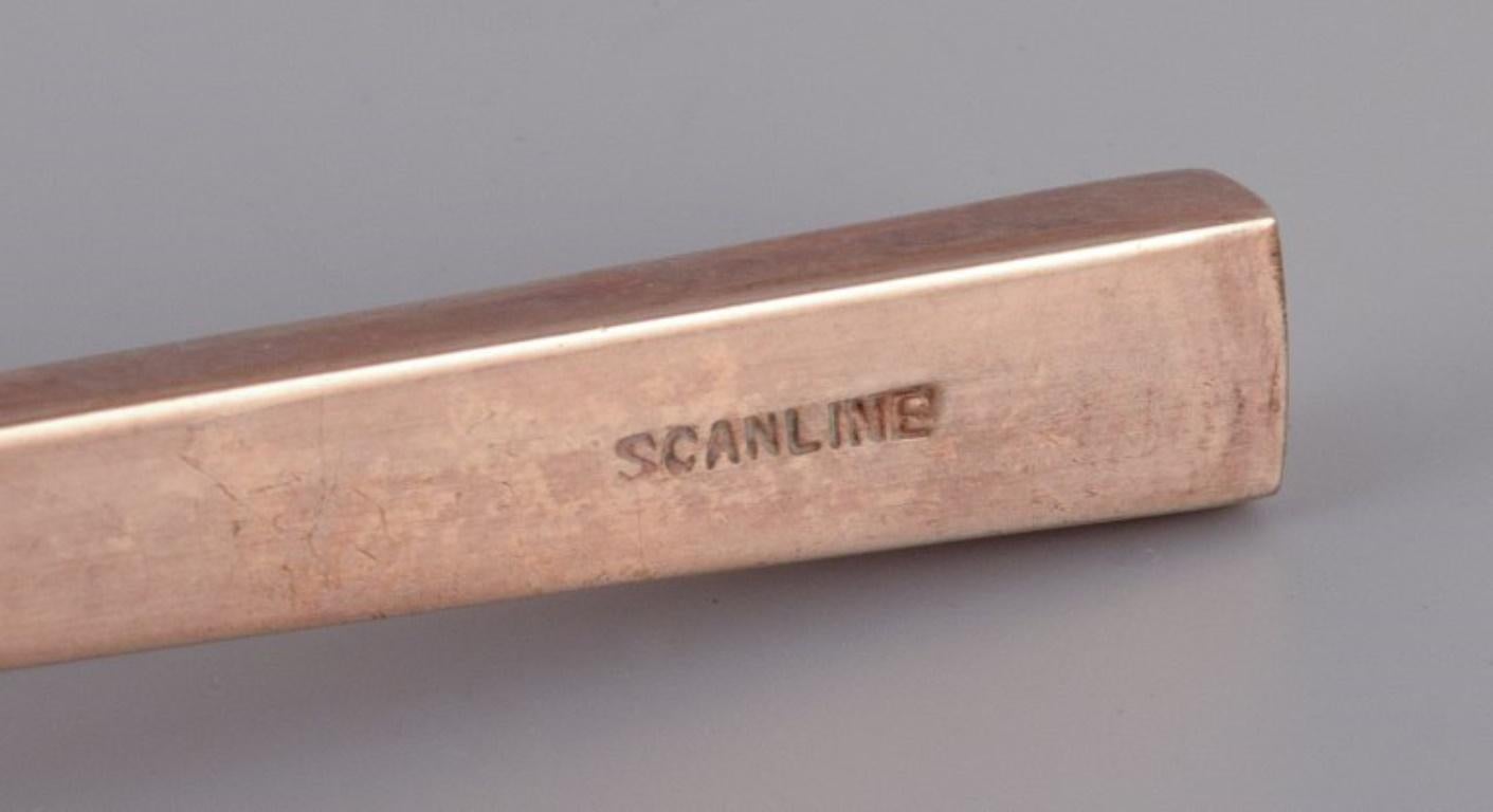 Brass Sigvard Bernadotte 'Scanline' cutlery set in brass. Ten spoons. 1960s/70s For Sale