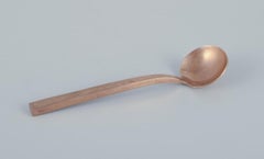 Sigvard Bernadotte 'Scanline'. Set of twelve jam/sugar spoons in brass.